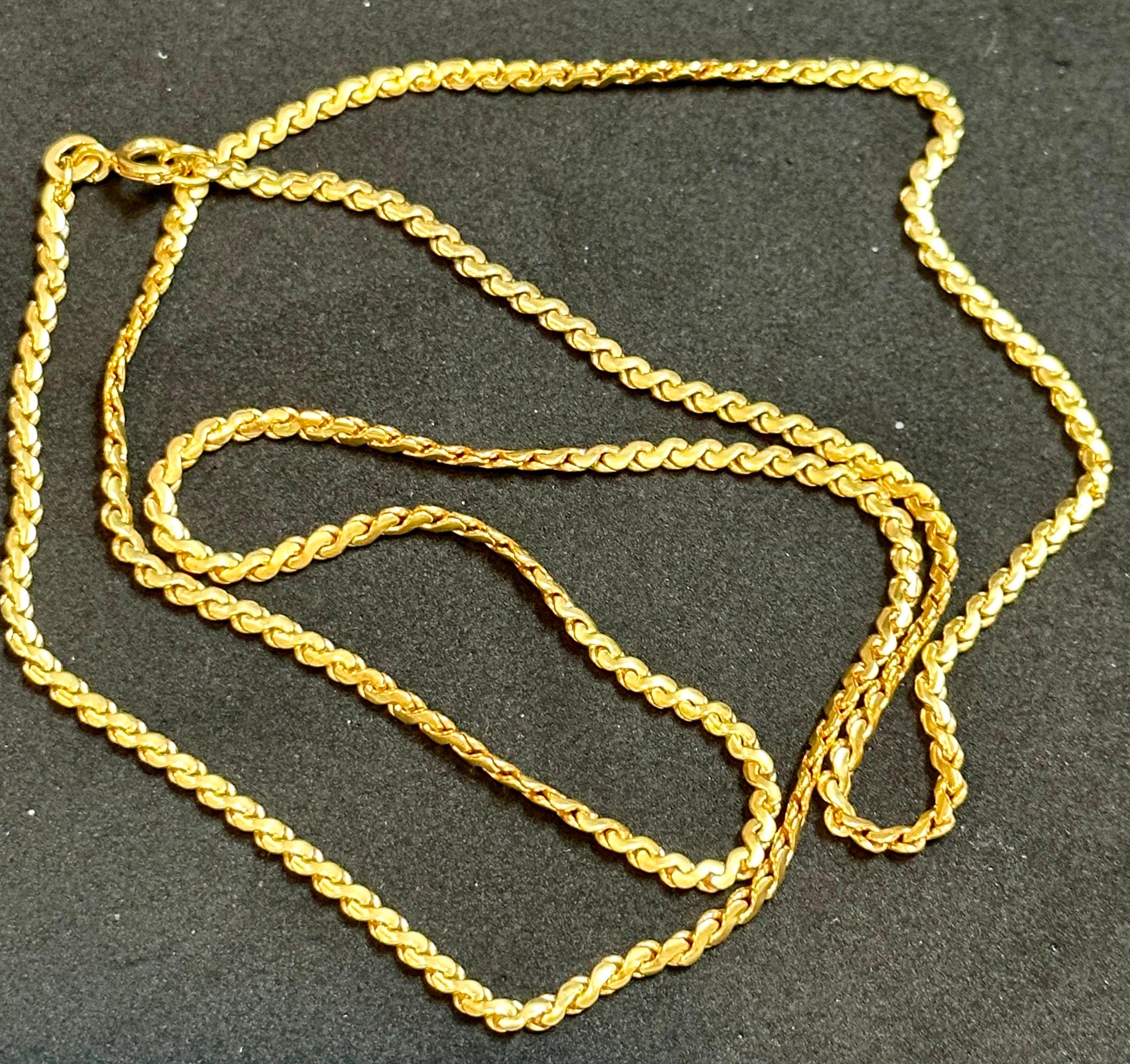 Vintage 18 Karat Yellow Gold 9.6  Gm S link  Chain Necklace, 24  Inch Long
1.22 MM wide
24 Inches long Necklace

Weight of the Necklace is 9.6 Grams 

Please look at all the pictures
Its very hard to capture the true color and luster of the Necklace