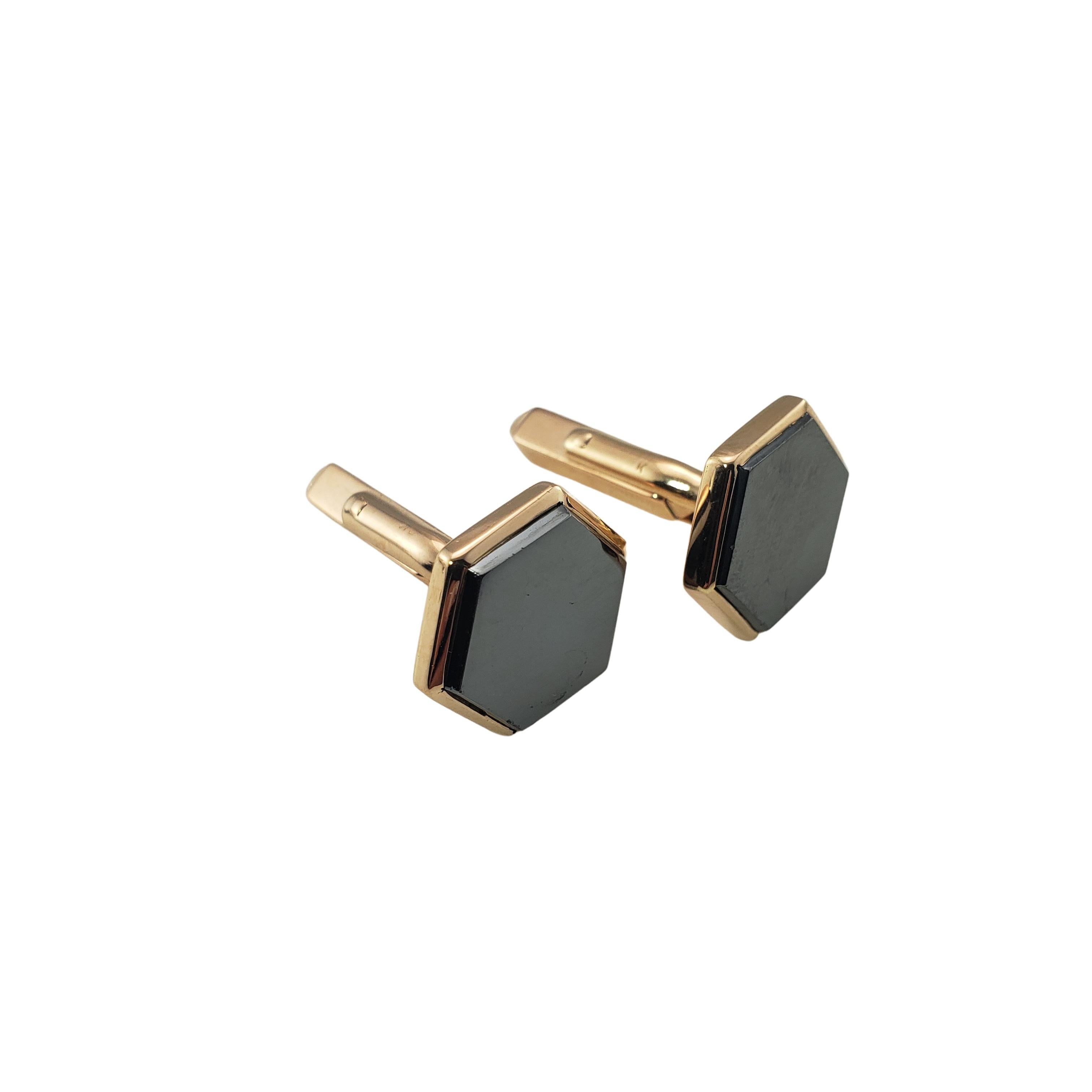 Vintage 18 Karat Yellow Gold and Hematite Cufflinks-

These elegant cufflinks feature lustrous hematite set in beautifully detailed 18K yellow gold.

Size: 17 mm

Weight: 9.4 dwt. / 14.7 gr.

Tested for 18K gold.

Very good condition, professionally
