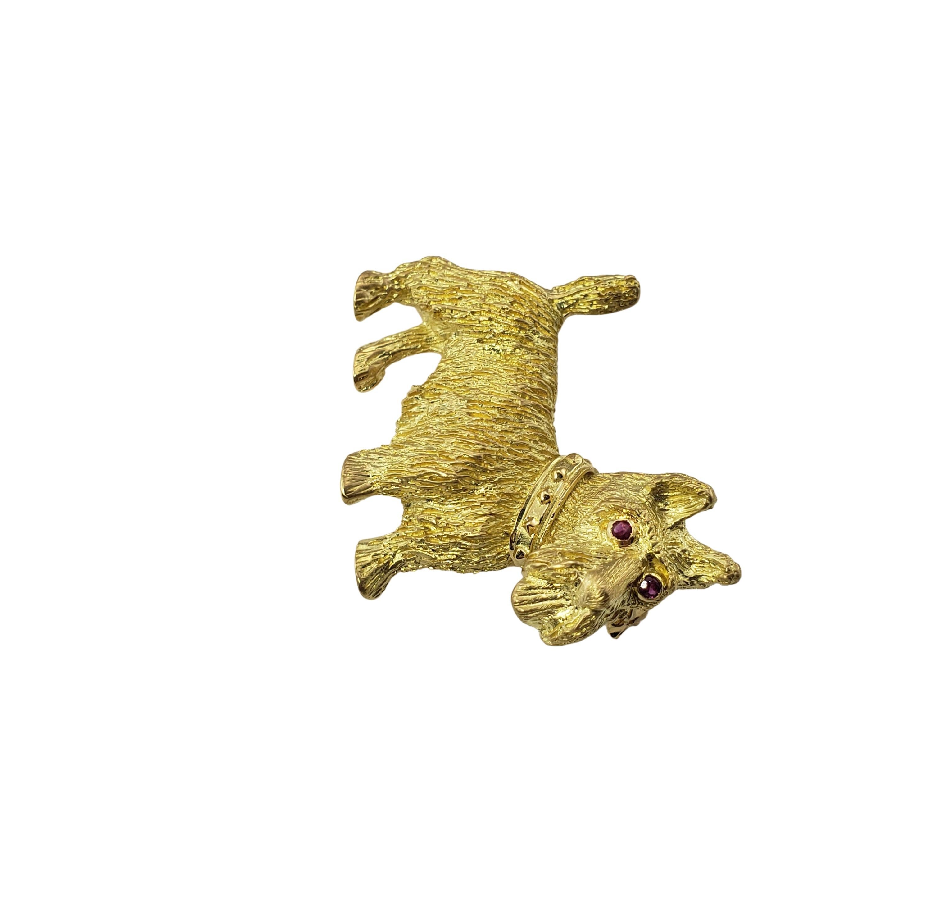 Vintage 18 Karat Yellow Gold and Ruby Scottish Terrier Brooch/Pin-

This beautifully crafted 18K yellow gold brooch features a meticulously detailed Scottish Terrier accented with two ruby eyes.

Size: 35 mm x 29 mm (Width x Height)

Weight: 7.7