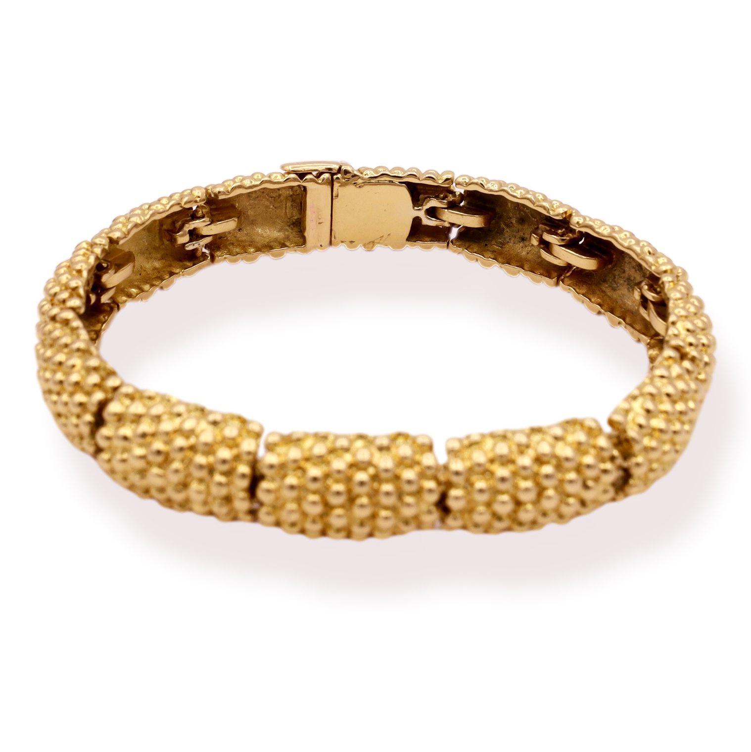 Vintage 18 Karat Yellow Gold Beaded Bombay Bracelet is a beautiful piece of jewelry that embodies timeless elegance and sophistication. The bracelet features a beaded design, in 18-karat yellow gold.  The metal weight of 44.5 grams gives this pieces