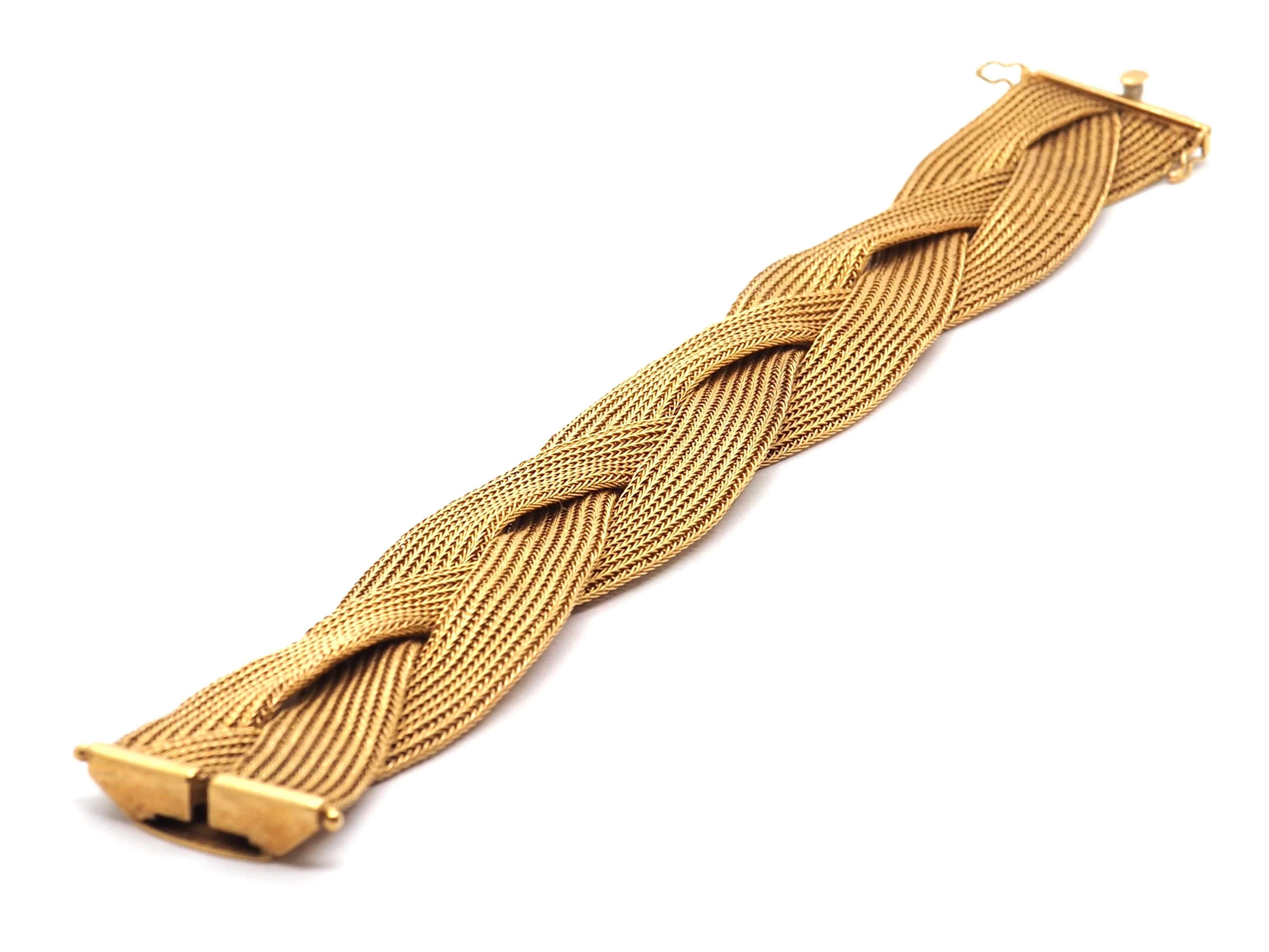 Soft vintage braided mesh bracelet crafted in 18 karat yellow gold. The bracelet has security lock 
Excellent everyday wear as well for a special occasion. 
Total length 19 cm and 2.5 cm width
45.7g 