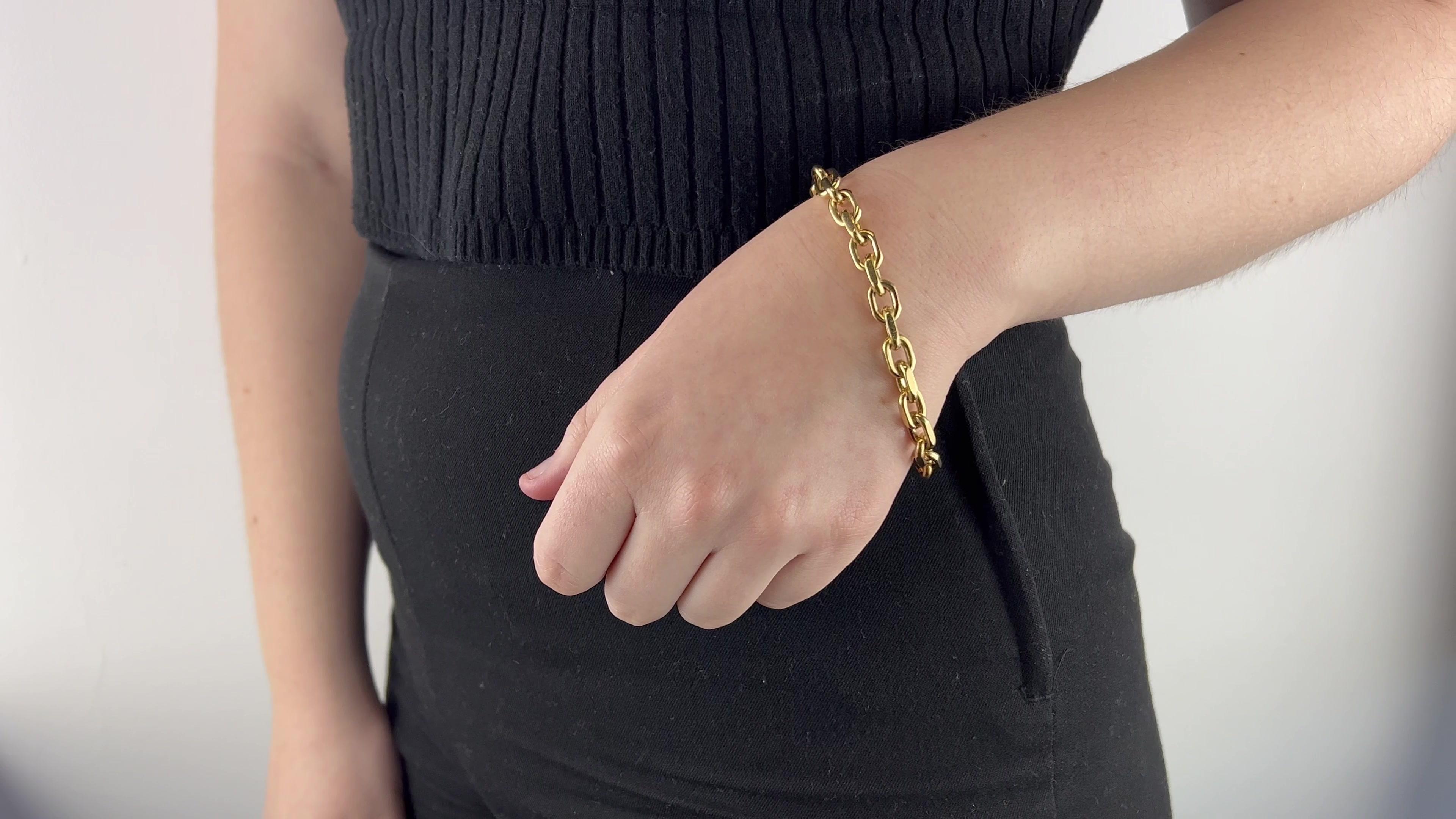 One Vintage 18 Karat Yellow Gold Cable Chain Bracelet. Crafted in 18 karat yellow gold with purity marks. Circa 1970s. The bracelet measures 8 inches in length. 

About this Item: Looking for a chunky classic chain link bracelet? We have the perfect