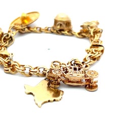 Pulsera vintage con dijes de oro amarillo de 18 quilates, 35,3 gramos, 6,5 pulgadas