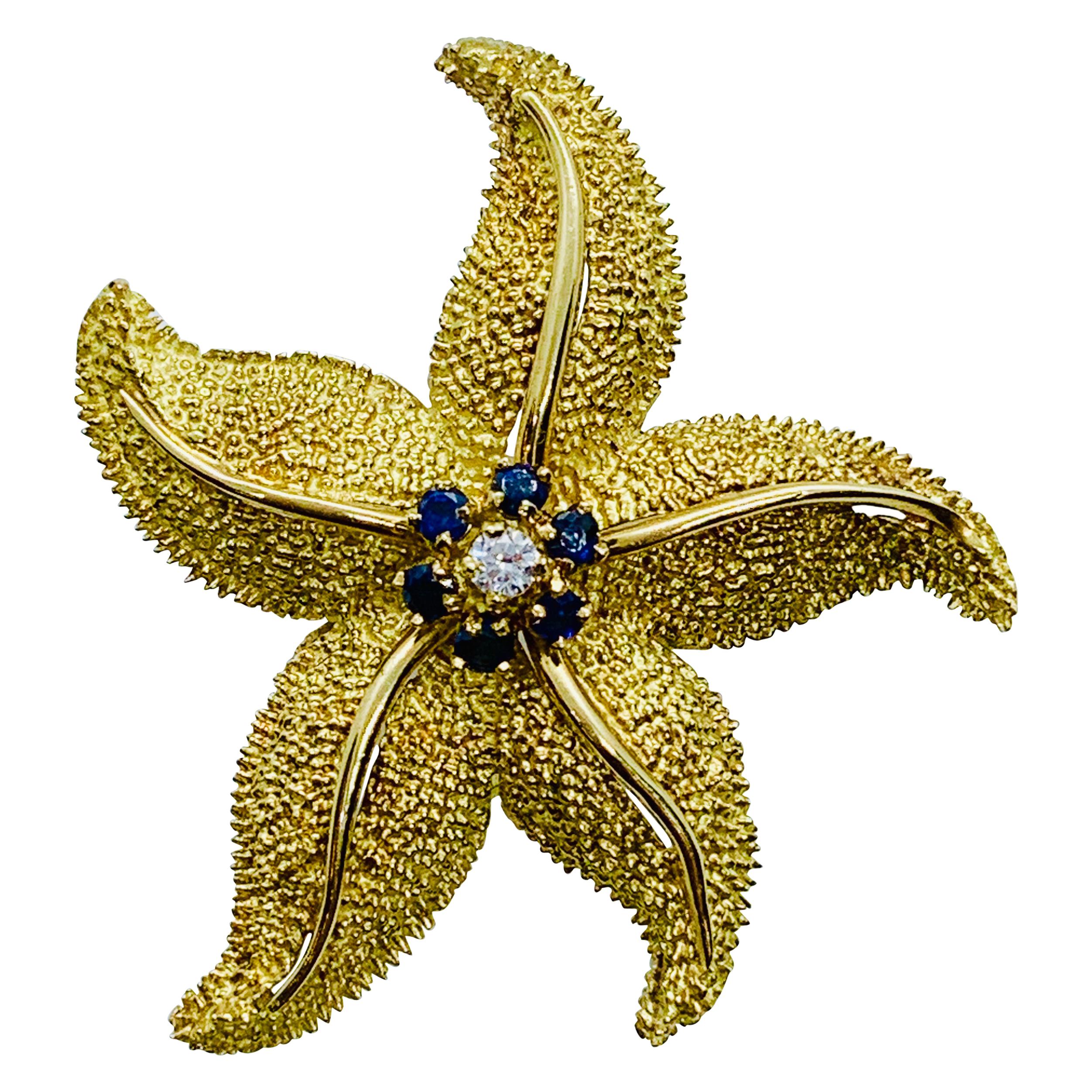 Vintage 18 Karat Yellow Gold Diamond and Blue Sapphire Starfish Brooch