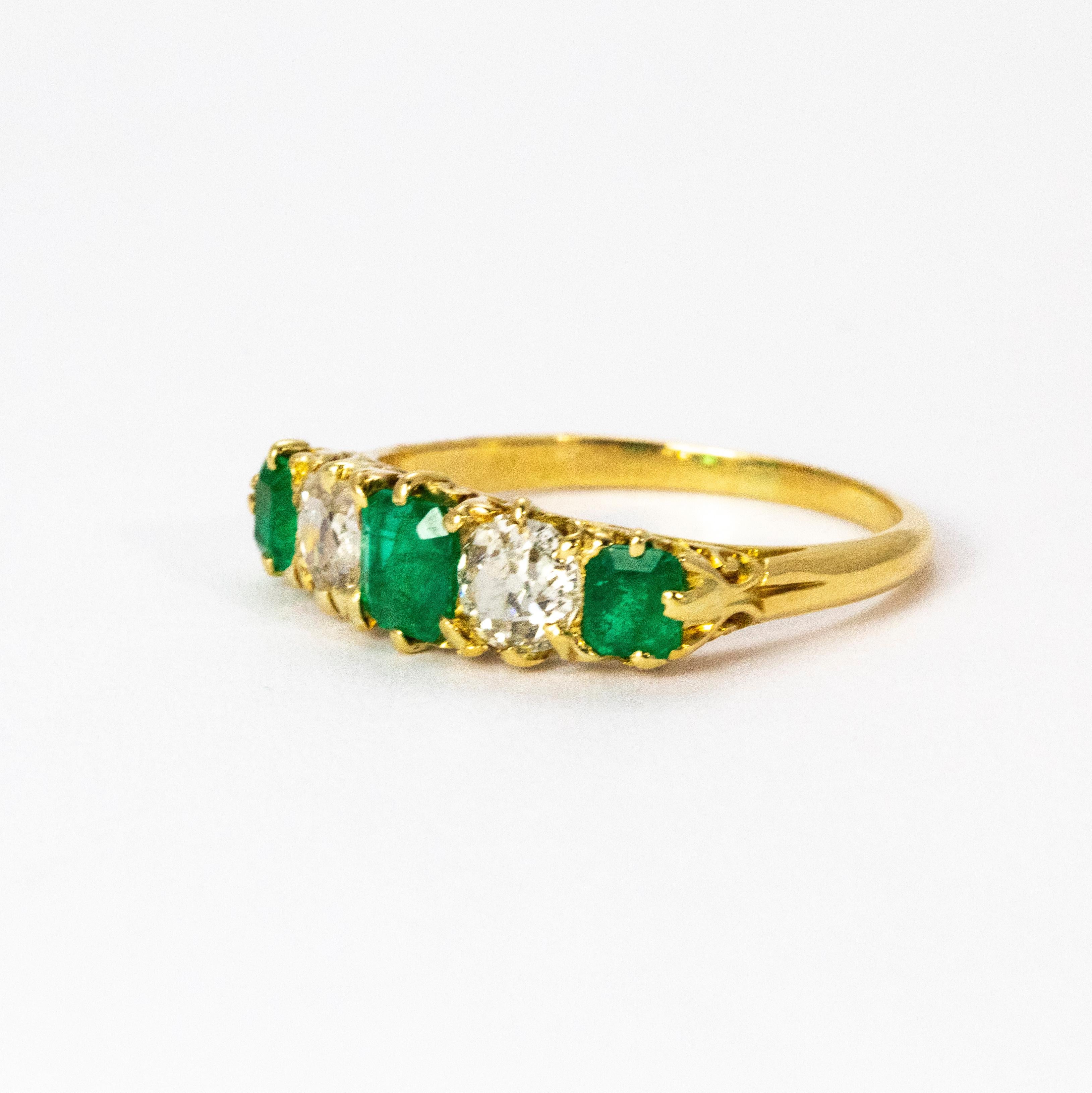 A stunning Vintage five-stone ring set with alternating white diamonds and green emeralds, all beautifully modelled in 18 karat yellow gold. Total diamond weight 1.02 carat.

Ring size: 9 or R