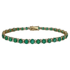 Vintage 18 Karat Gold 5.80 Carat Emerald 0.45 Carat Diamond Tennis Bracelet