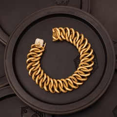 Vintage 18 Karat Yellow Gold Georges Lenfant for OJ Perrin Rope Scroll Bracelet