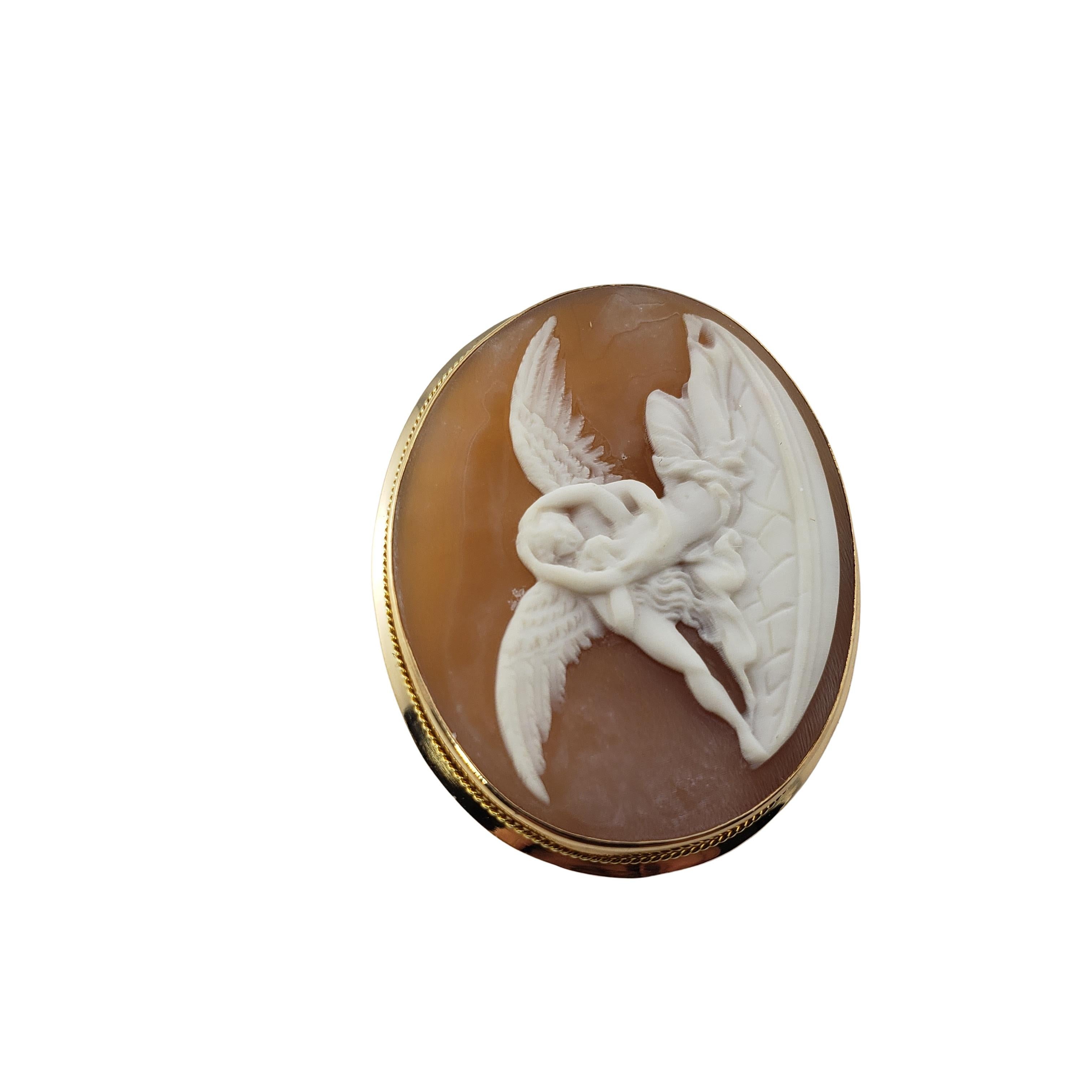 Vintage 18 Karat Yellow Gold Guardian Angel Cameo Brooch/Pin-

This stunning cameo brooch features a figure embracing their guardian angel.  Set in classic 18K yellow gold.

Size:  37 mm x  29 mm

Weight:  3.5 dwt. /  5.5 gr.

Hallmark:  18K

Very