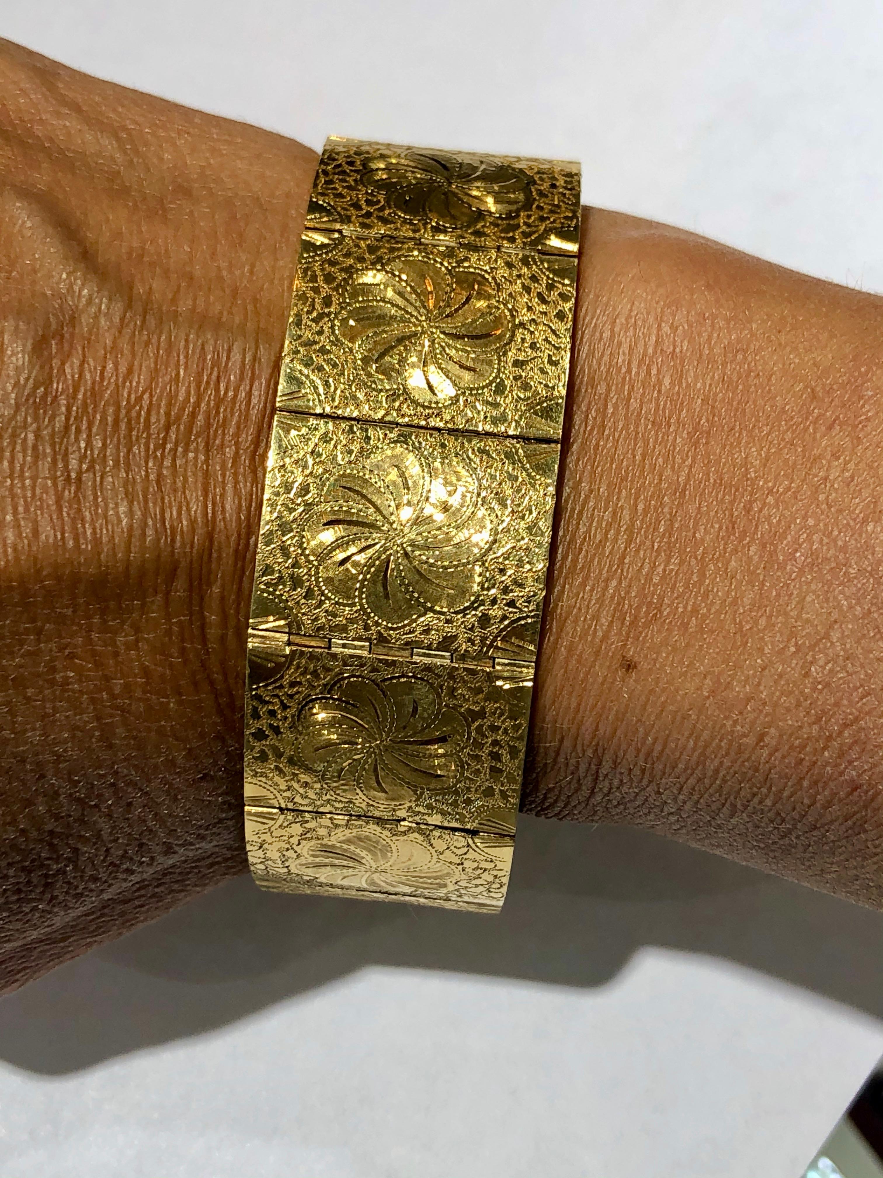 Vintage late 70's early 80's bracelet, masterfully crafted from solid 18 Karat yellow gold hand engraving work. Wonderful addition to your jewelry collection! 
DIMENSIONS:
Wide  .94 in. x  Length 7.5 in
Wide  23.88 mm x Length 190.5 mm
Weighs 61.3