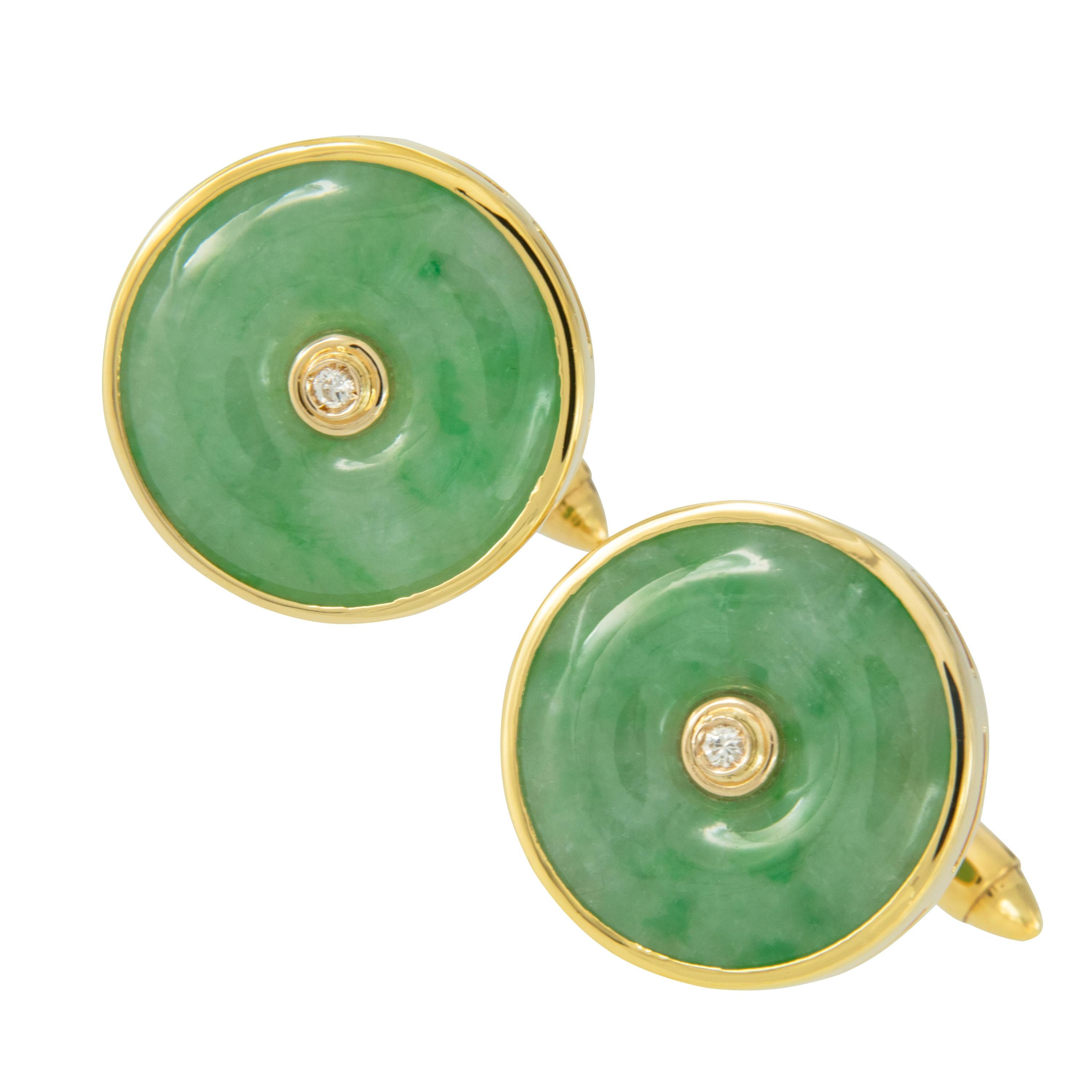 Jade, or The Emperor's Stone, has been a symbol of status, purity & health with ancient kingdoms starting wars over significant jade pieces. These handsome classic green jade cufflinks are made from rich 18 karat yellow gold with the simple elegance