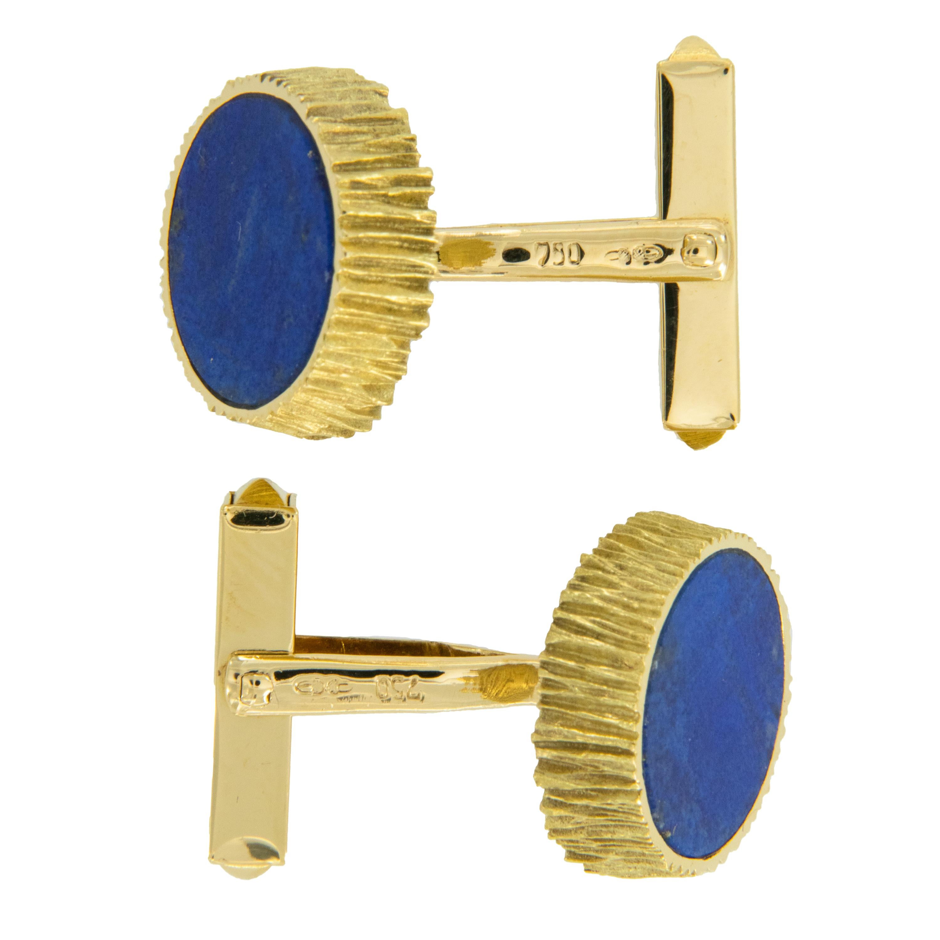 Used as a gemstone for over 6,500 years, lapis has long been a symbol of both royalty & honor. These fine blue lapis cufflinks will make you feel like a king while wearing them! Made from fine, rich 18 karat yellow gold with rippled texture &