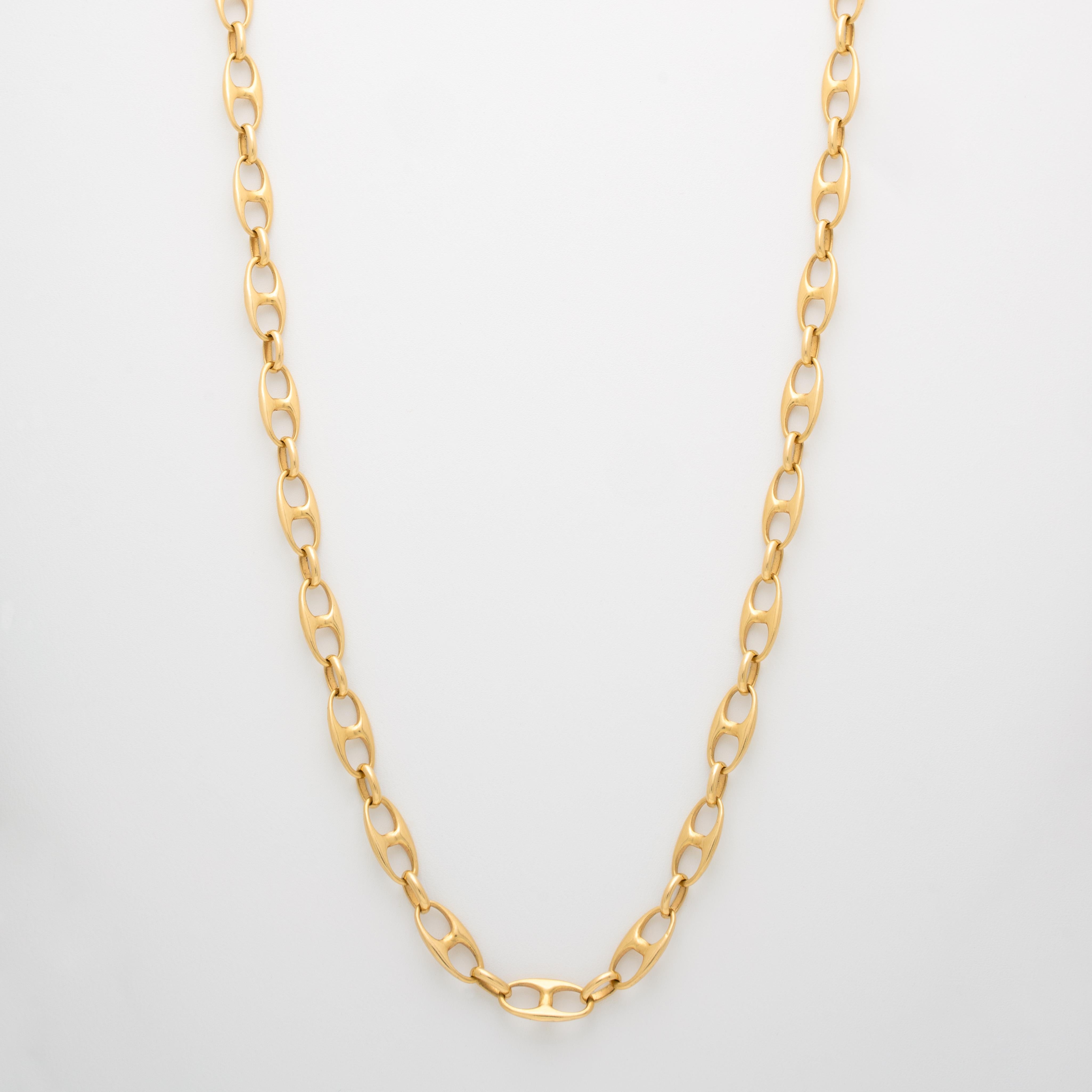 Vintage 18 Karat Yellow Gold Marine Link Chain c.1970s

Period: Vintage
Year: c.1970s
Material: 18k Yellow Gold 
Weight: 32.9g
Length: 31.5 inches
Width: 3.54mm
Condition: Very Good Vintage Condition

Image on is for the longer of 2 chains in