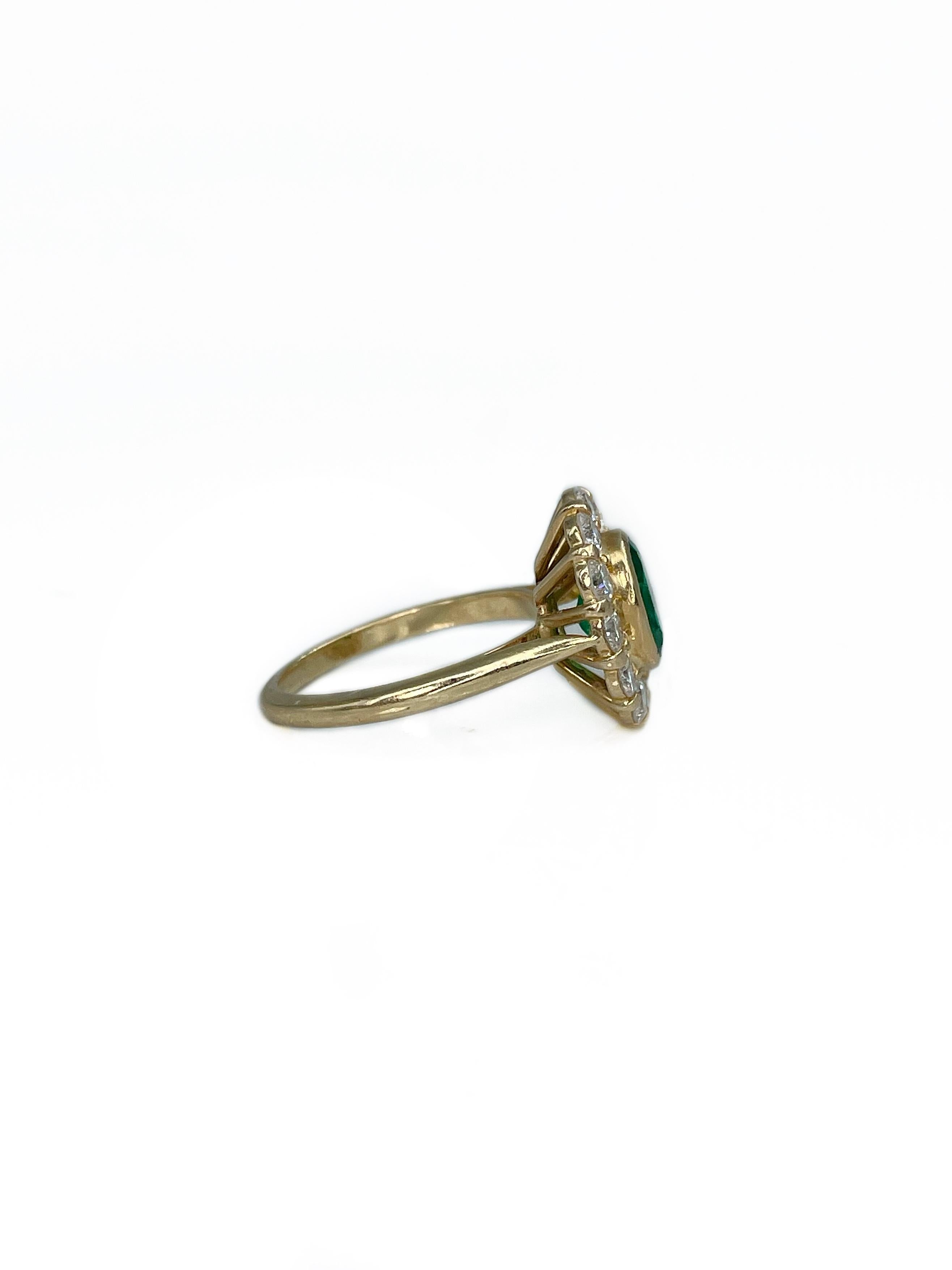 Oval Cut Vintage 18 Karat Gold 0.80 Carat Emerald 1.10 Carat VS Diamond Cluster Ring For Sale