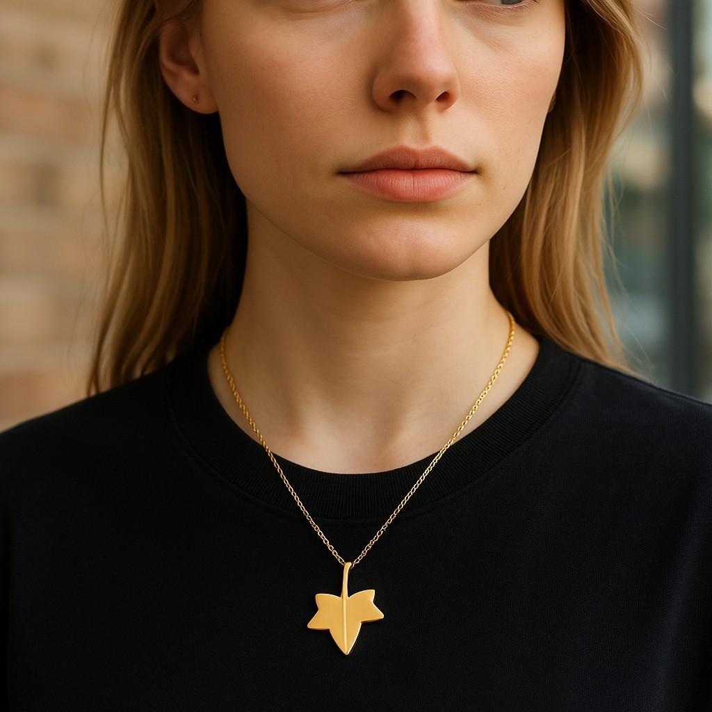 Contemporary Vintage 18 Karat Yellow Gold Rare Tiffany & Co Angela Cummings Leaf Pendant Neck For Sale