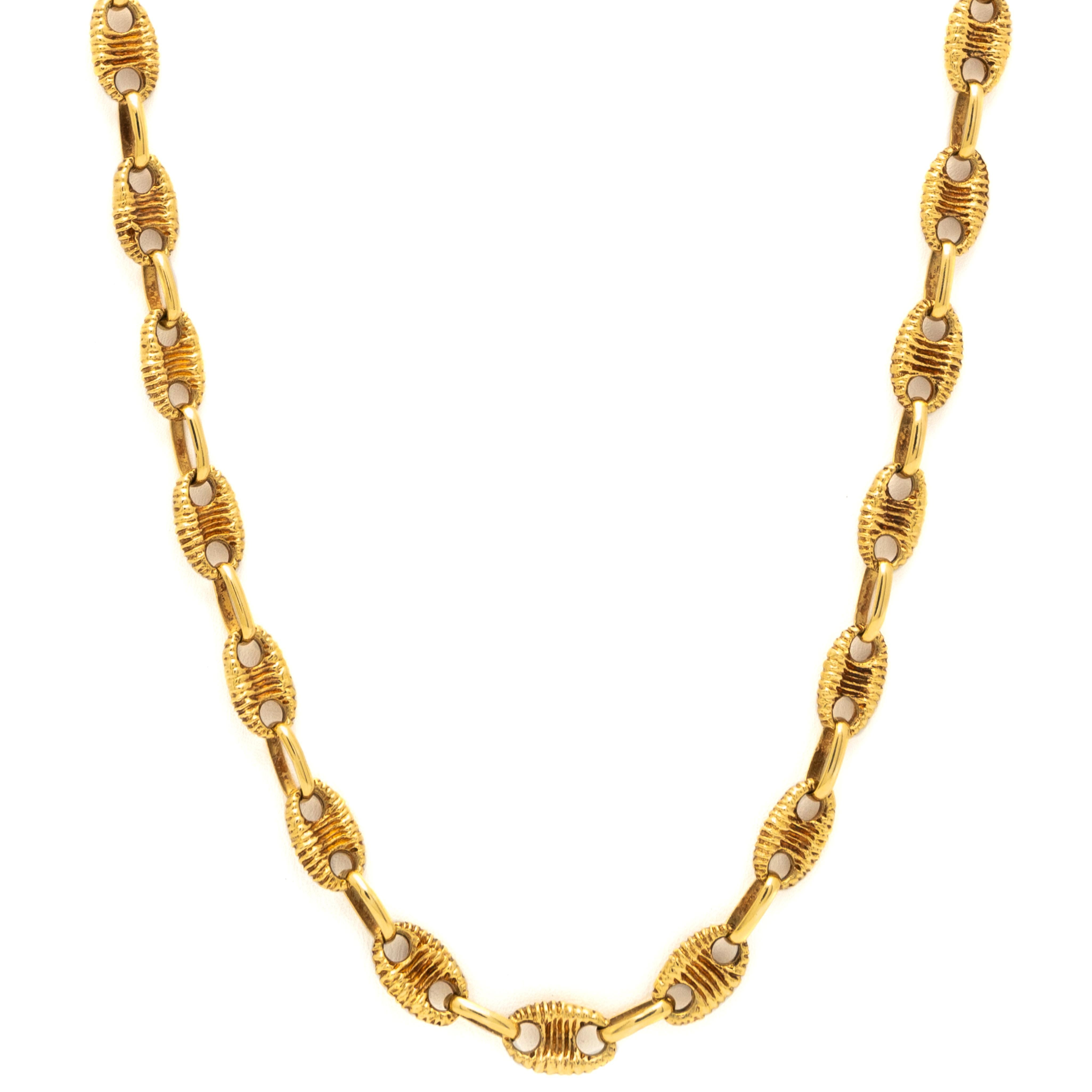 Vintage 18K Yellow Gold Textured Marine Link Chain c.1970s

Period: Vintage
Year: c.1970s
Material: 18k Yellow Gold 
Weight: 35.48g
Length: 24 inches
Width: 5.87mm at Widest Point
Condition: Excellent