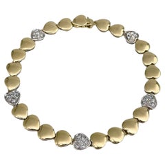 Vintage 18 Karat Yellow Gold TW 0.24 Carat Diamond Heart Tennis Bracelet