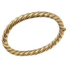 Retro 18 kt. gold hinged bracelet with spiral twist design 