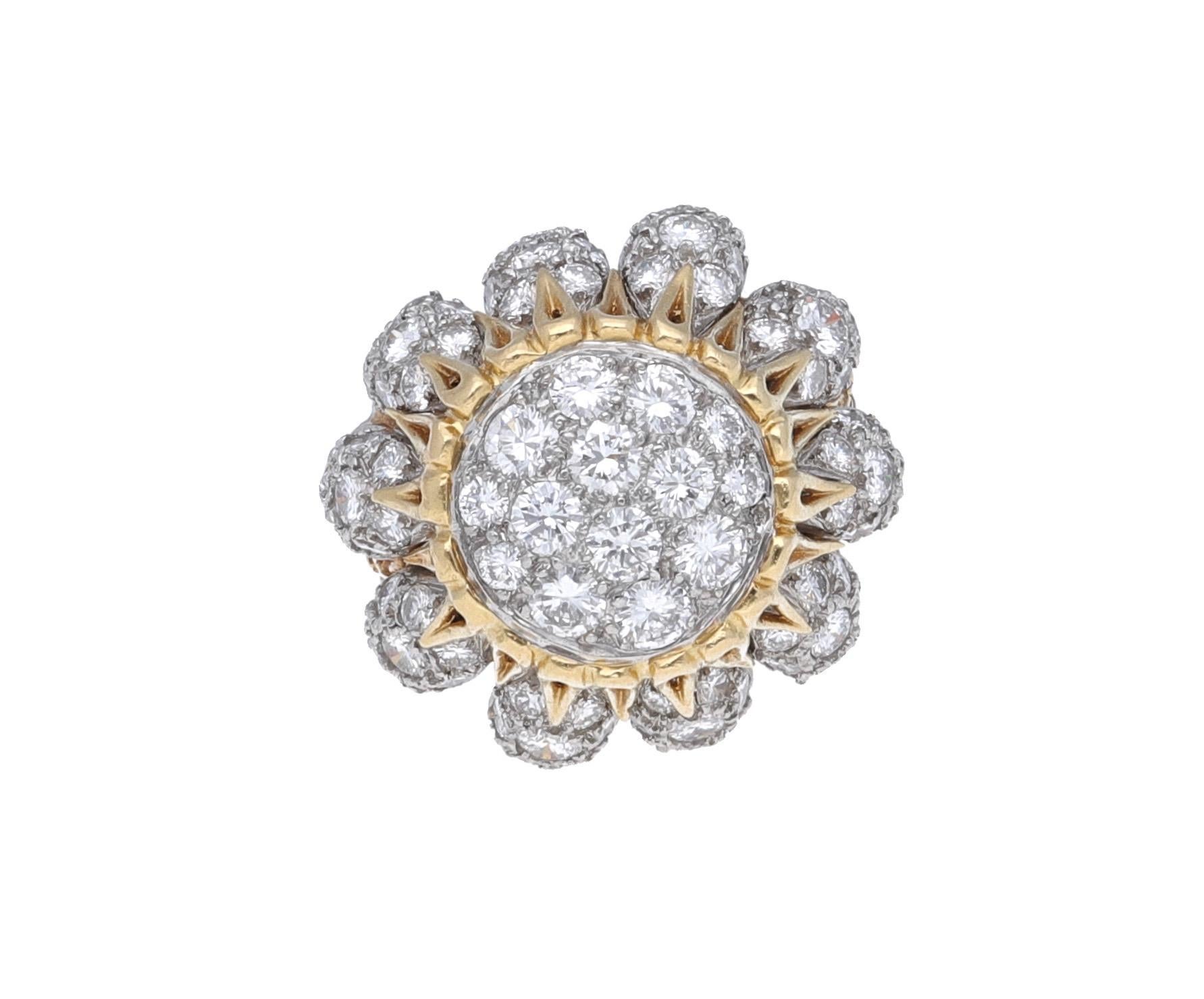 18 kt. gold yellow and white gold dome ring with 5.50 carat of round-cut diamonds.
This ring is 1950 circa and is one of a kind piece and is hand made in USA.
Size ring is 6.5 
