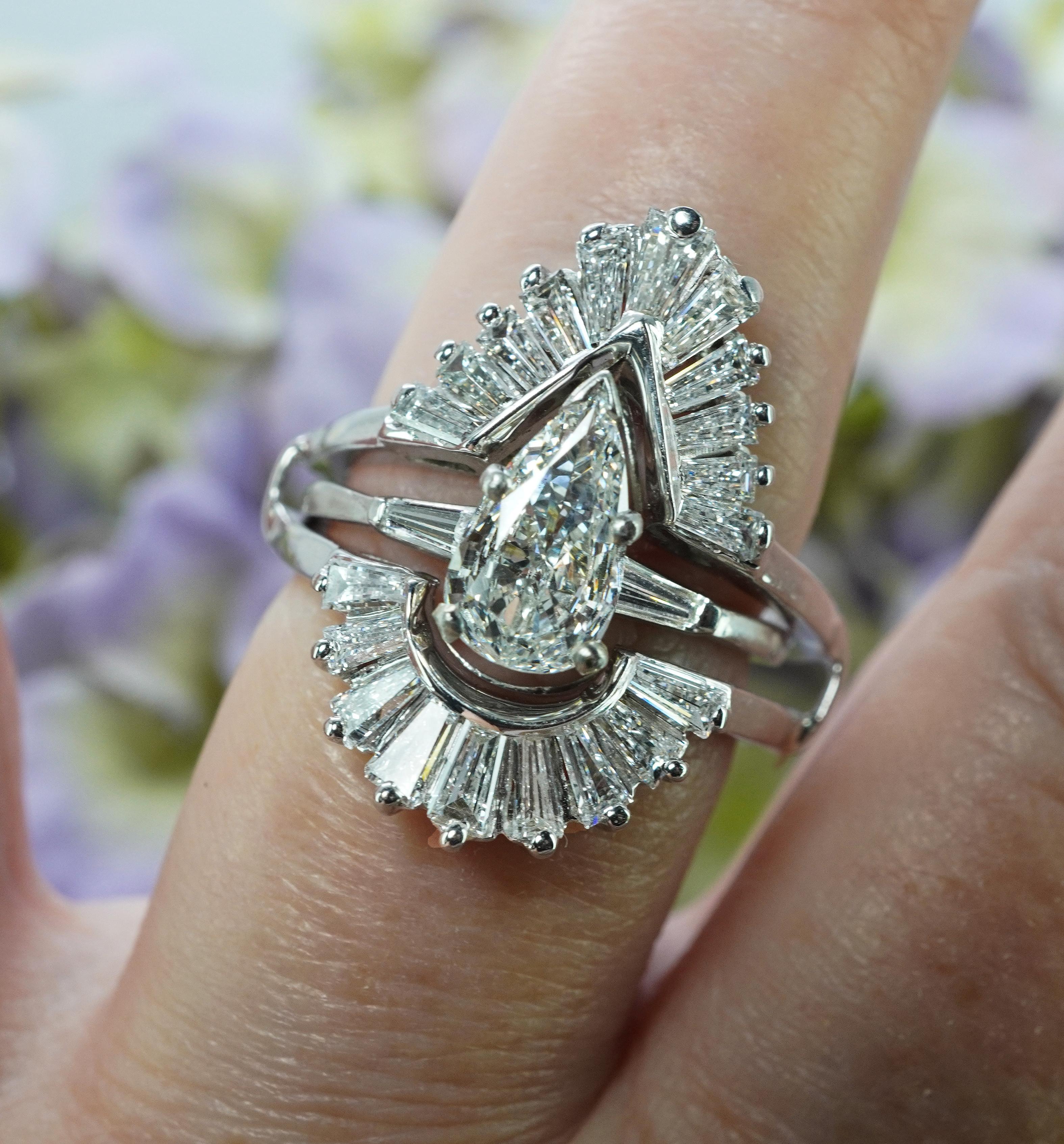  Vintage 1.80ct Baguette Diamond Wedding Guard Ring 14K White Gold Estate Pear cut

This piece came to us from a fine estate and is crafted in luxurious 14K white gold set with scintillating diamonds. There is also a serial number there. It will fit