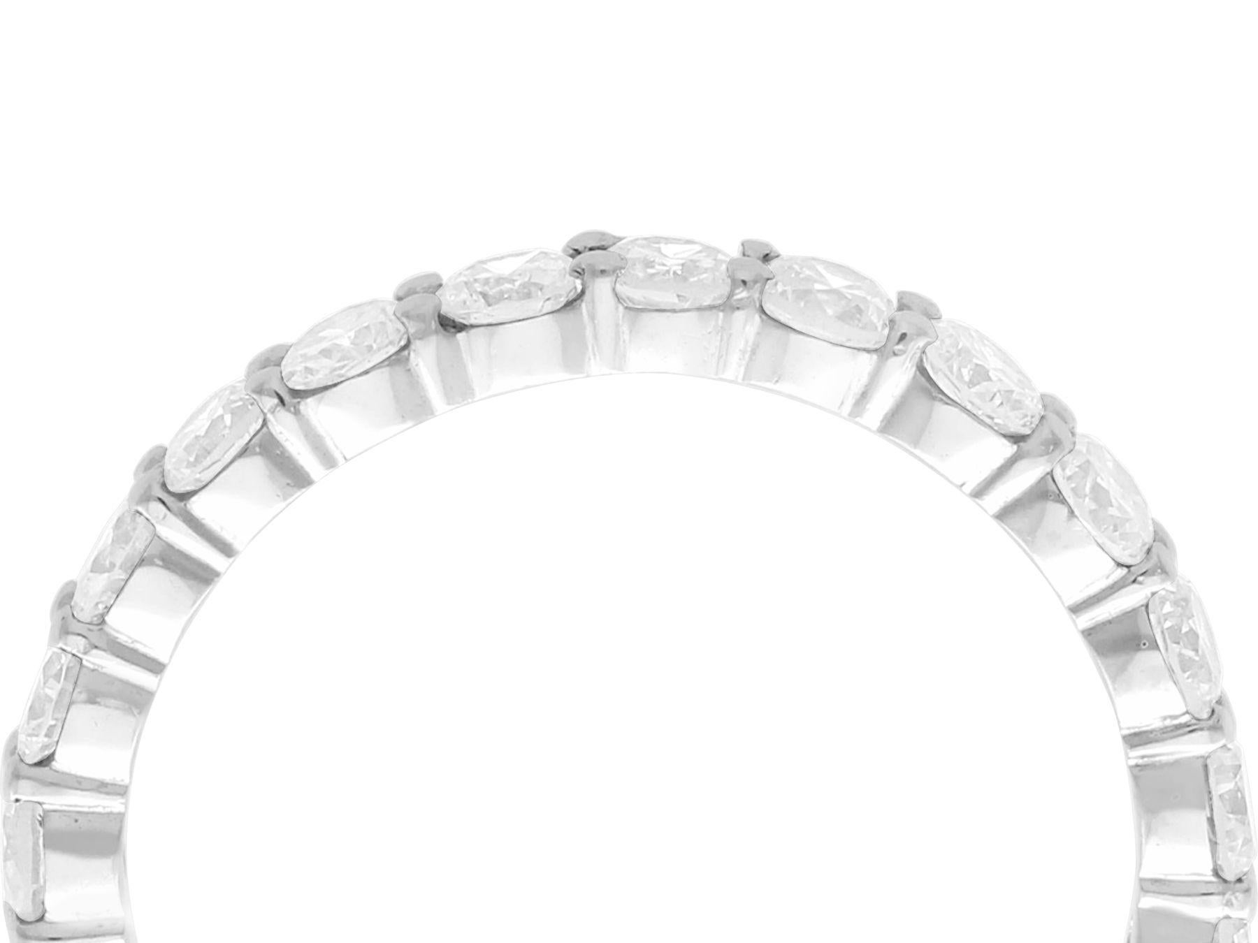 A fine and impressive vintage 1.84 carat diamond, 18 carat white gold full eternity ring; part of our vintage jewelry/estate jewelry collections.

This fine and impressive vintage eternity ring has been crafted in 18 ct white gold.

The fine 18 ct