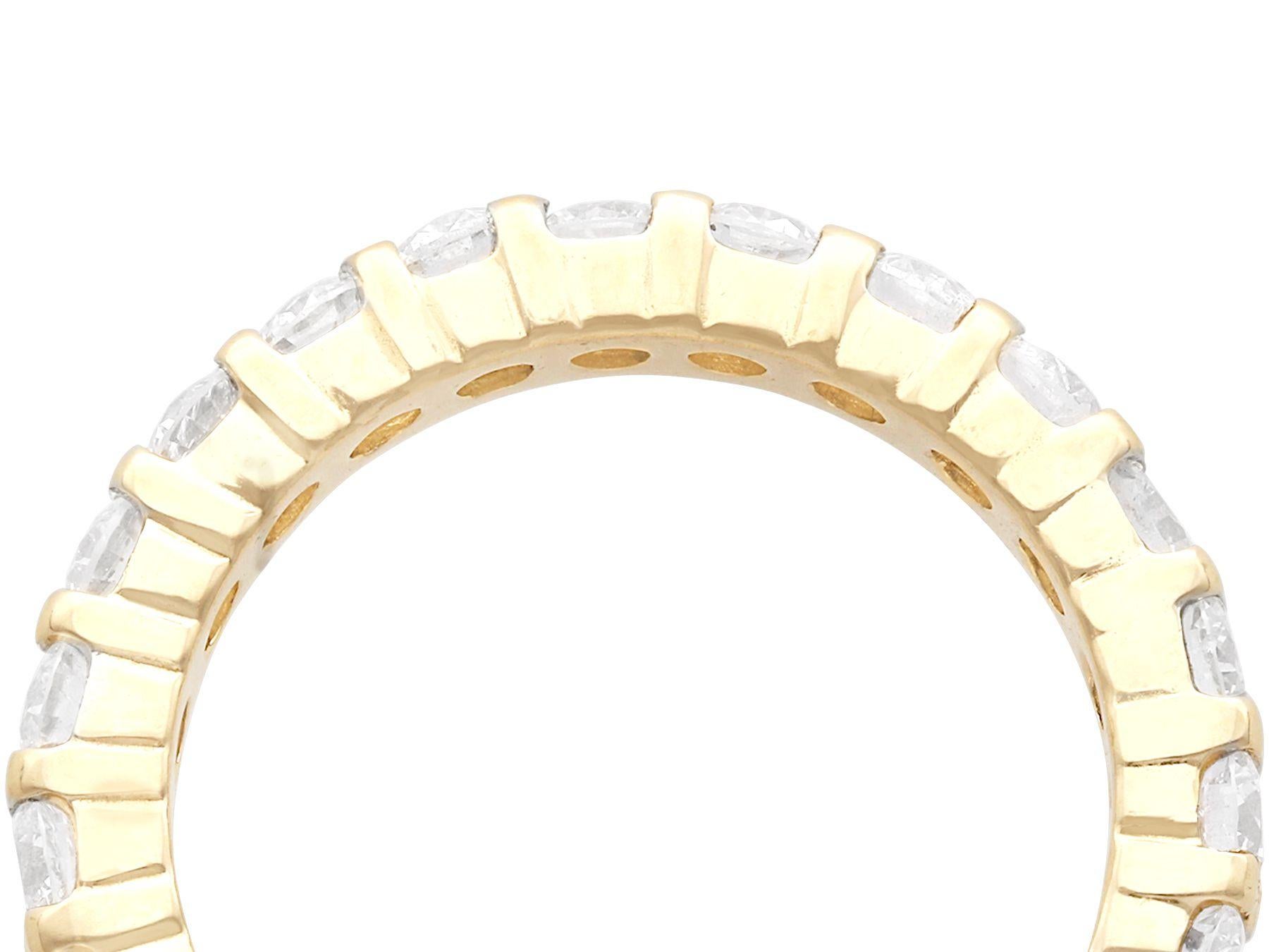 A fine and impressive vintage 1980s 1.84 carat diamond and 14 karat yellow gold full eternity ring; part of our diverse diamond jewellery and estate jewelry collections.

This fine and impressive vintage diamond ring has been crafted in 14k yellow