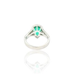 Vintage 1.85 Carats pear shape emerald and diamond ring
