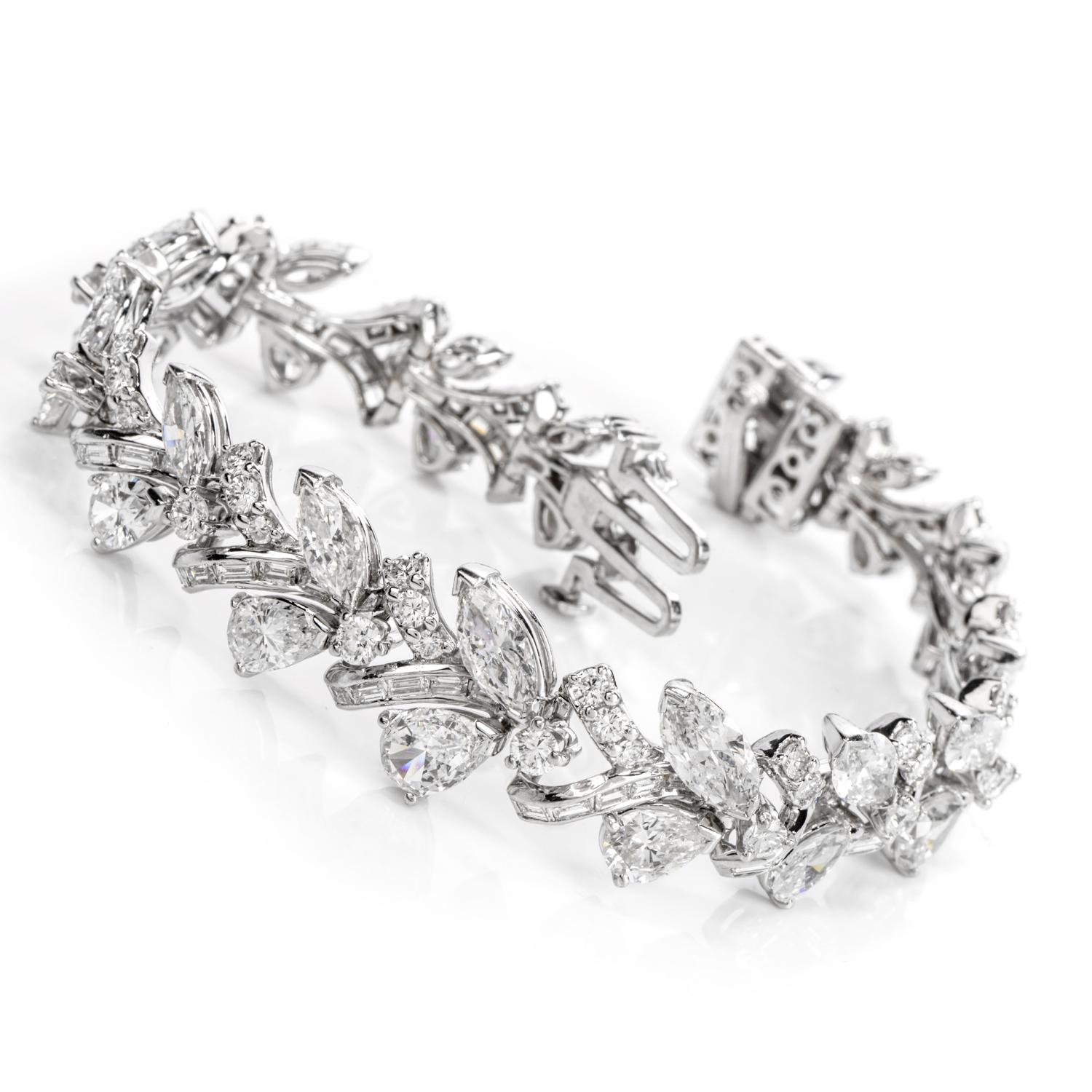 This vintage Platinum bracelet features a gorgeous curvilinear inks design adorned
with 15 genuine pear cut Diamonds, 15 marquise-cut diamond,  68 genuine baguette cut Diamonds and 68 genuine round brilliant cut.

This vintage Platinum bracelet