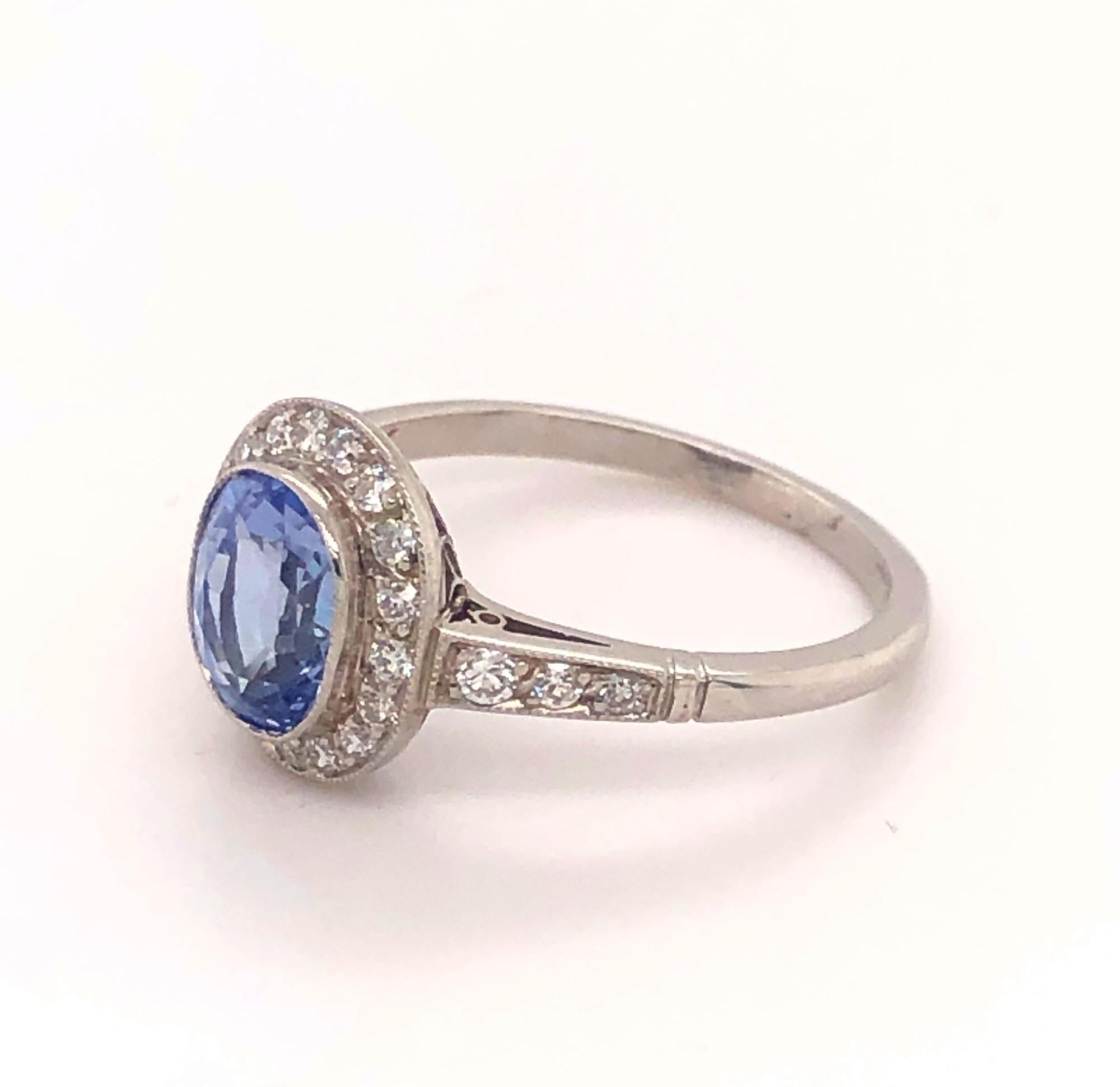 Art Deco Vintage 1.86 Ceylon Sapphire Diamonds Platinum Halo Ring For Sale