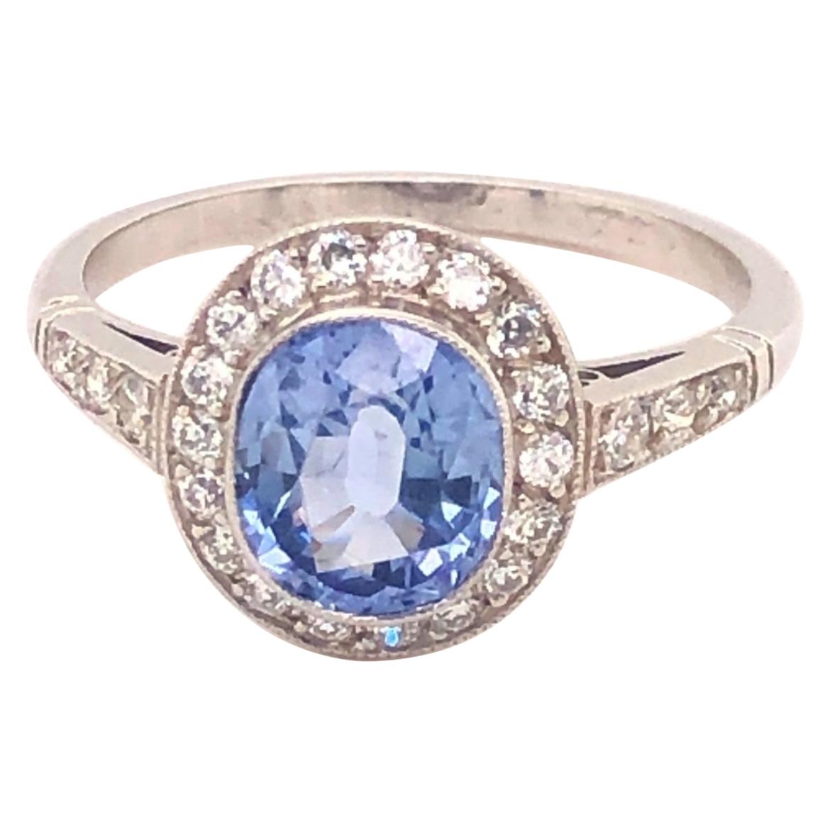 Vintage 1.86 Ceylon Sapphire Diamonds Platinum Halo Ring For Sale