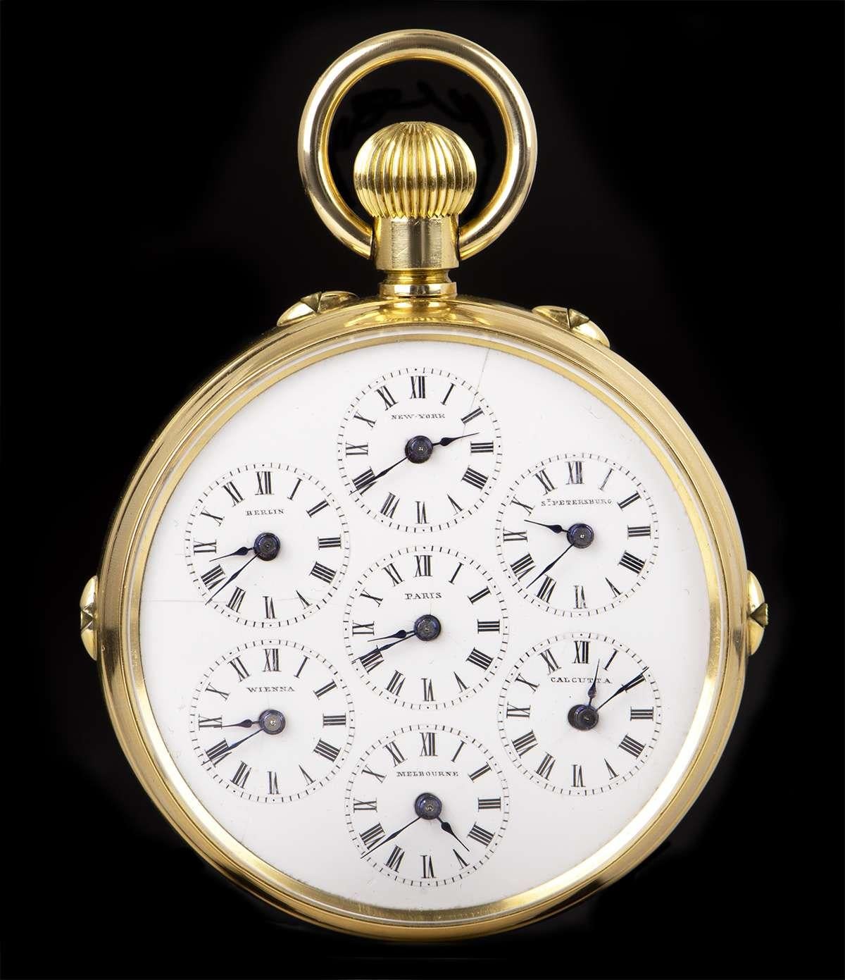 A Rare 18k Yellow Gold Double Sided World Time Full Calendar Vintage Gents Pocket Watch, white enamel dial with roman numerals, date sub-dial at 3 0'clock, month and small seconds sub-dial at 6 0'clock, weekday sub-dial at 9 0'clock, moonphase