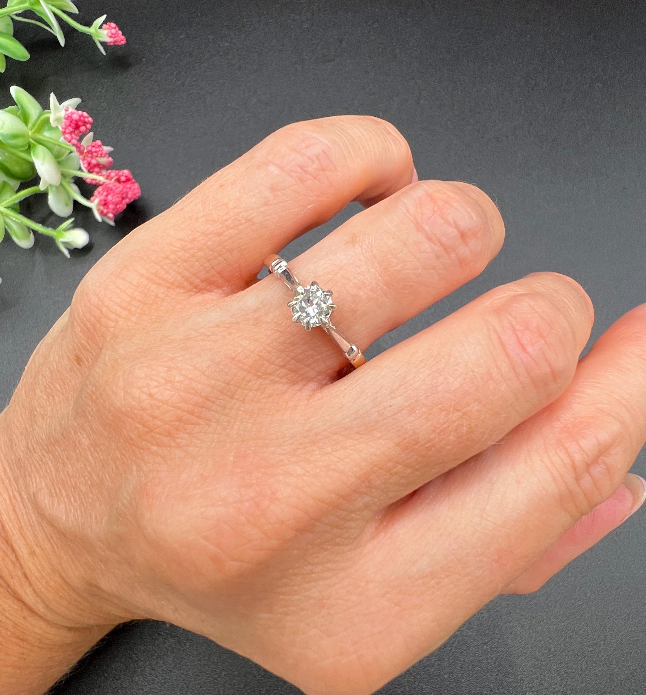 Vintage Engagement Ring

18ct Gold

Circa 1940s

Step back in time with this exquisite vintage engagement ring from the 1940s, showcasing timeless elegance and craftsmanship. Crafted from 18ct yellow gold, this ring features a beautiful single stone