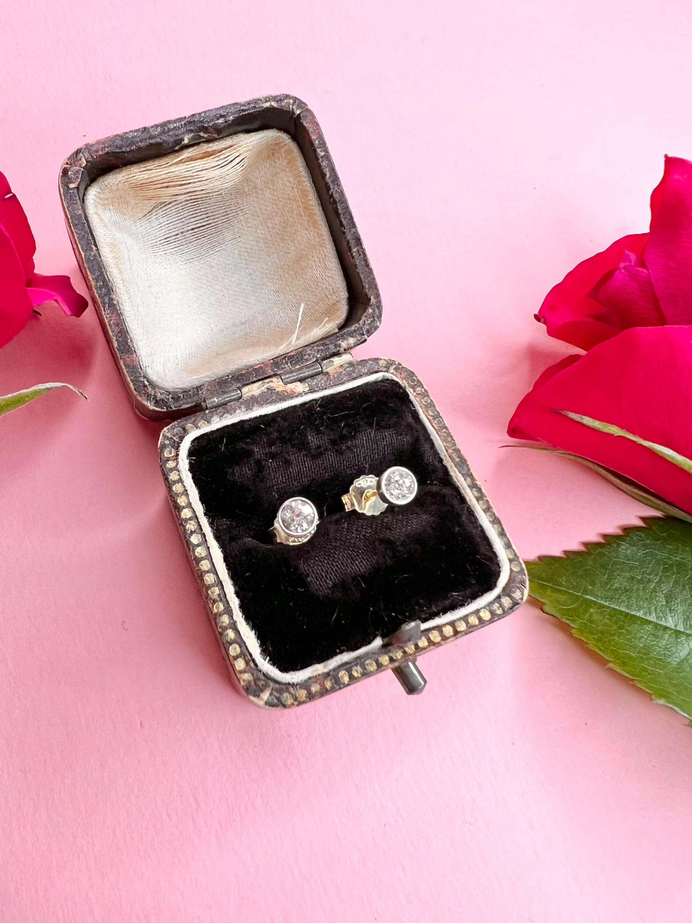 Vintage Diamond Stud Earrings 

18ct Yellow & White Gold 

Beautiful Little Rub Over Set Diamond Stud Earrings. Set with Old European Cut Diamonds from an Old Antique Brooch. 

Total Diamond Weight Approx 0.40cts

Measures Approx 4mm

All of our