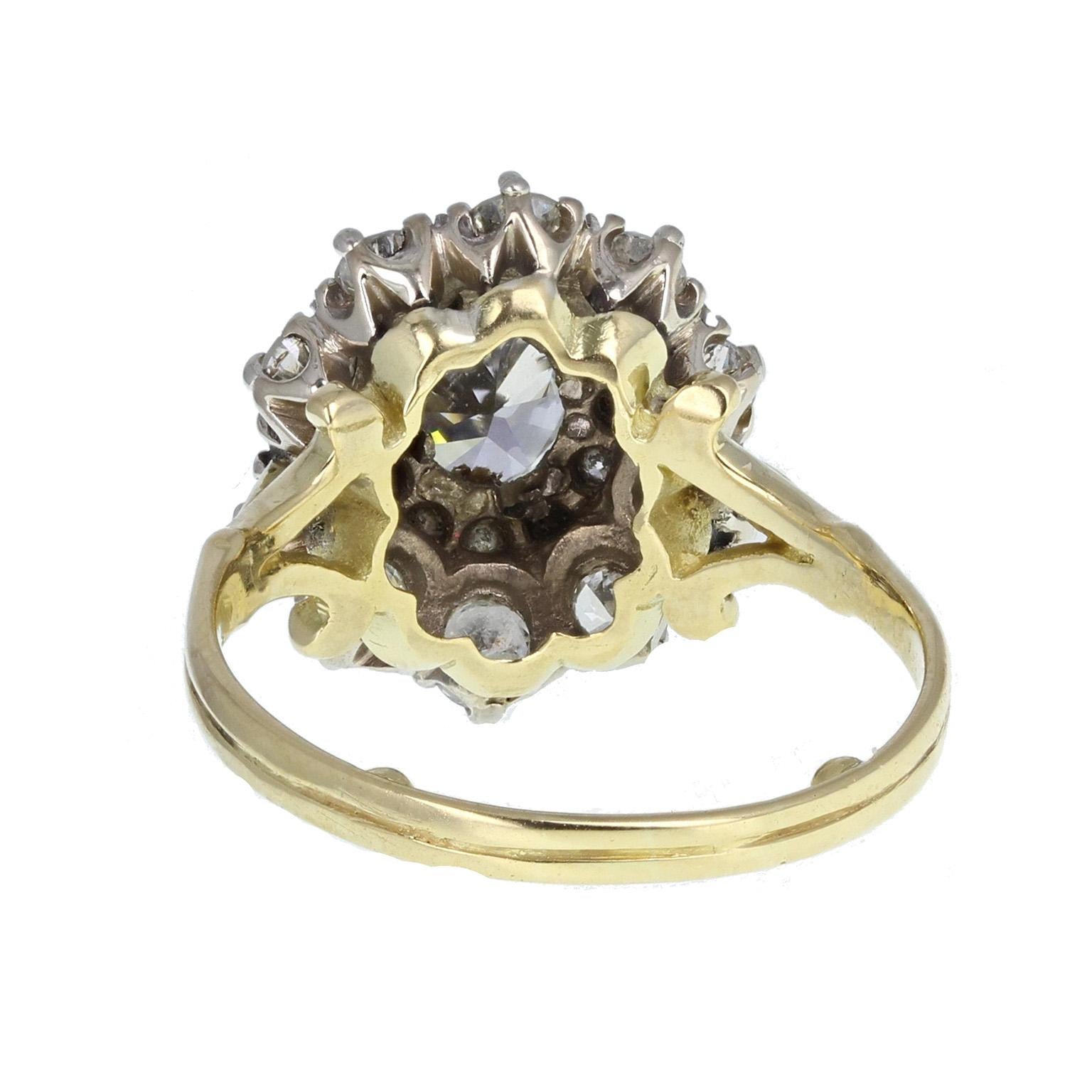 vintage oval diamond cluster ring