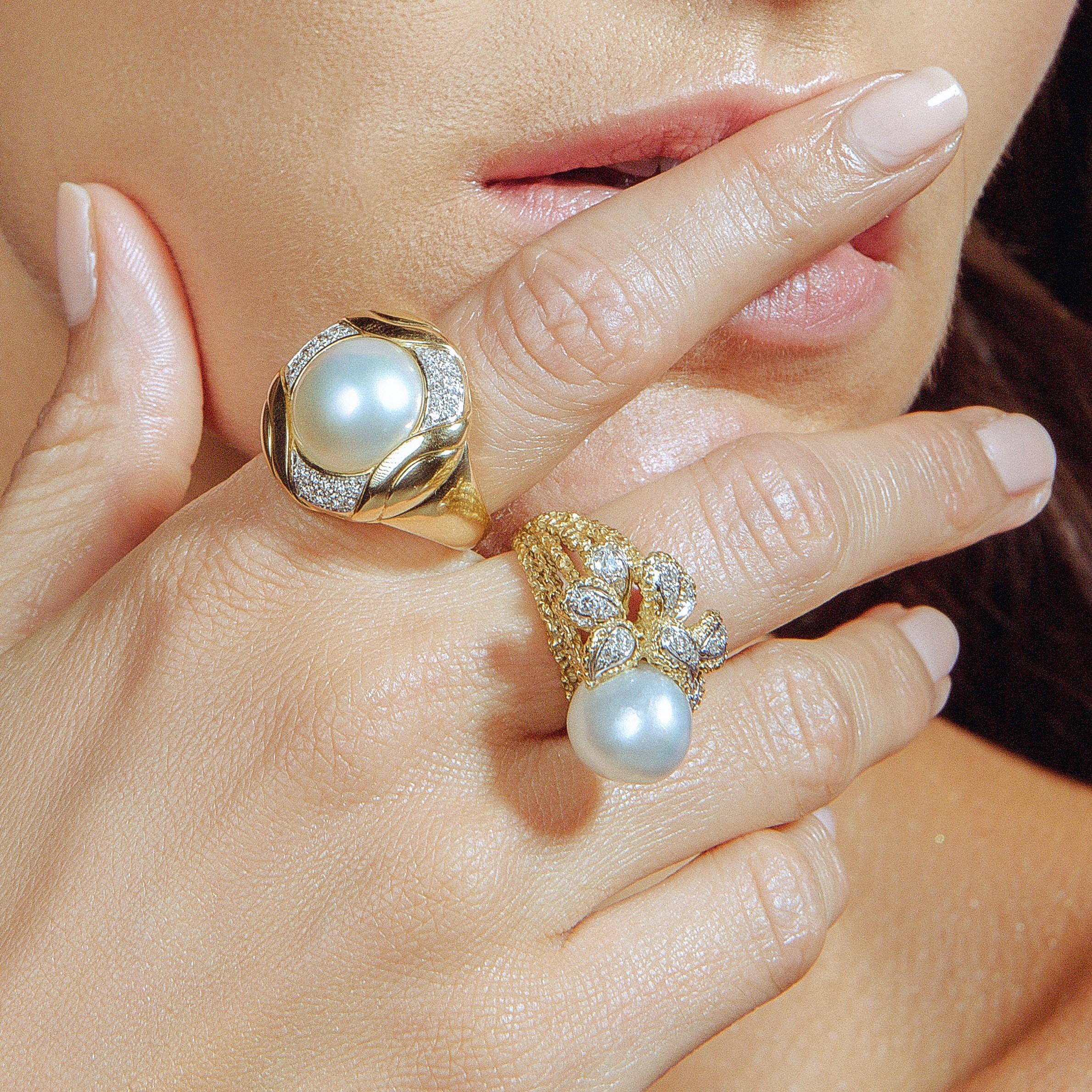 You can almost see yourself shimmer in this ultra-lustrous gold pearl ring! Measuring an eye-catching 15mm and boasting the finest snow-white colour, the round mabe cultured pearl casts a velvety mirror-like glow from atop a chic bomb style