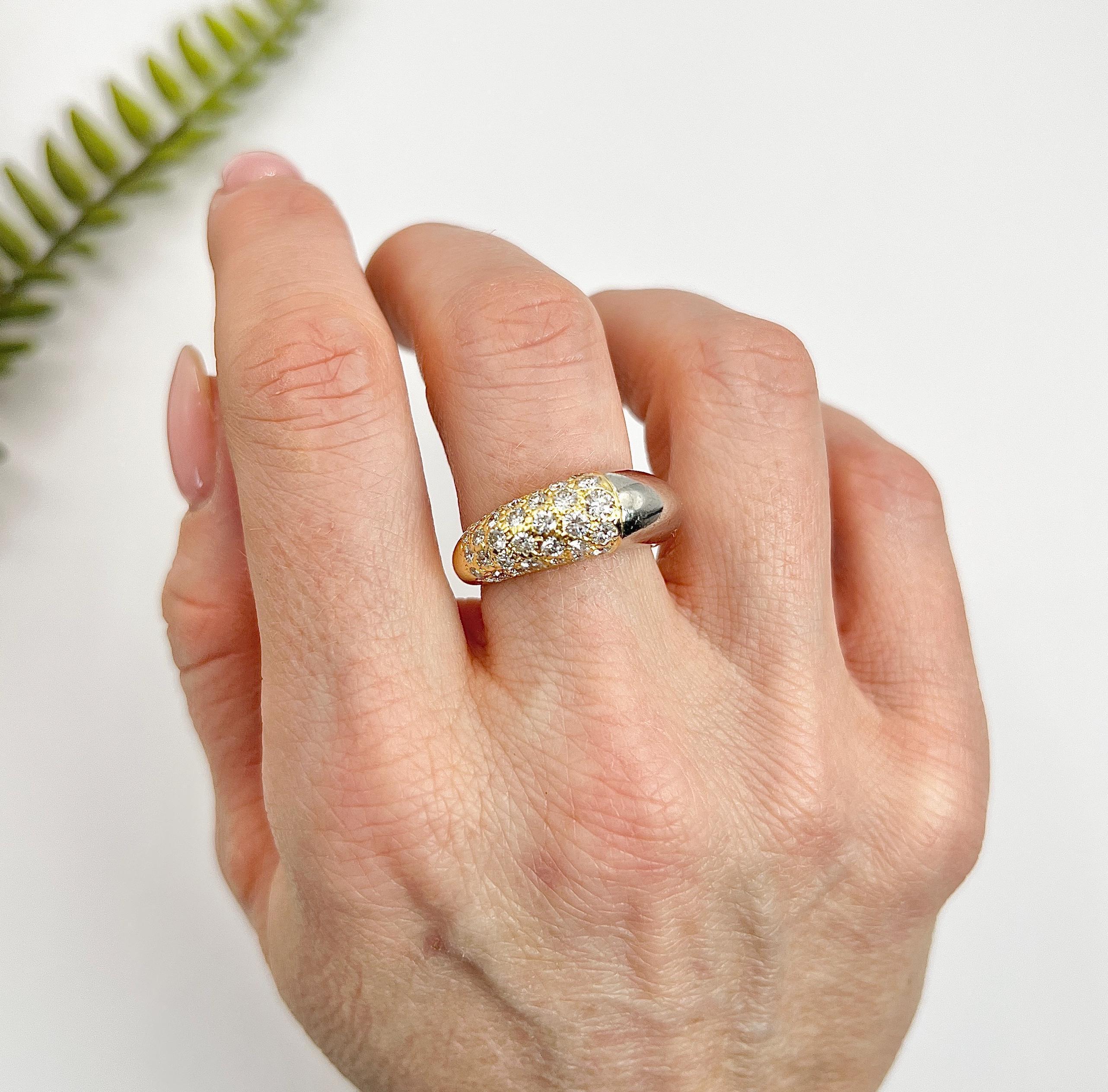 Vintage Cocktail Ring 

18ct Gold & Platinum French

Circa 1940s 

Elevate your jewellery collection with this exquisite bombe-style ring, masterfully crafted in 18ct yellow gold and platinum. This unique piece features a beautifully designed