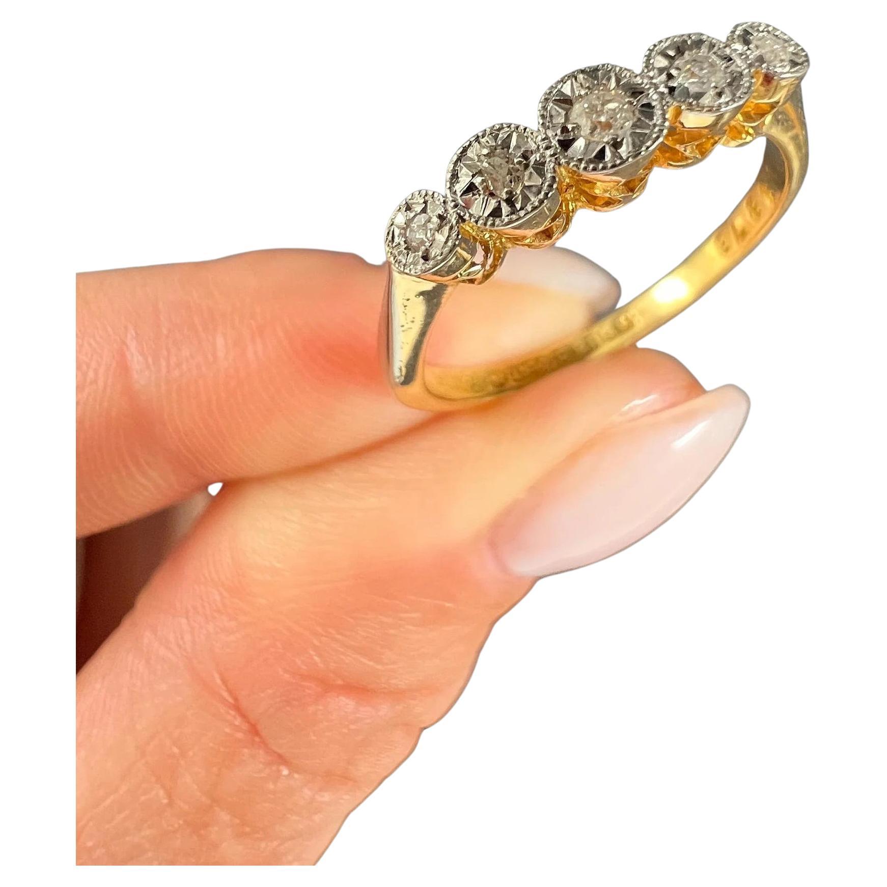Anillo vintage de oro de 18 ct y platino con 5 diamantes de la década de 1980