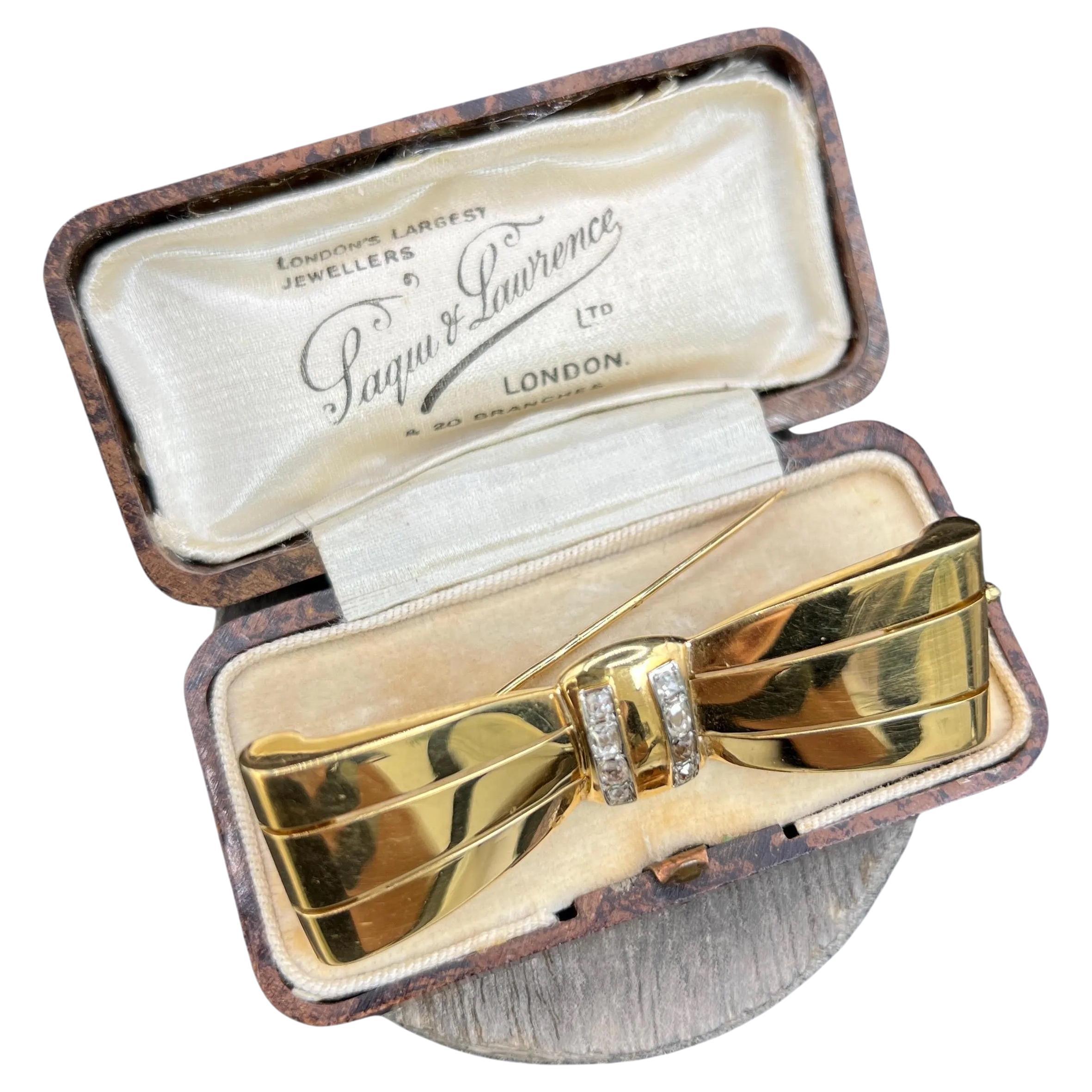 Vintage 18ct Gold Stamped, 1940s Bow Shaped Brooch with Cushion Cut Diamonds For Sale