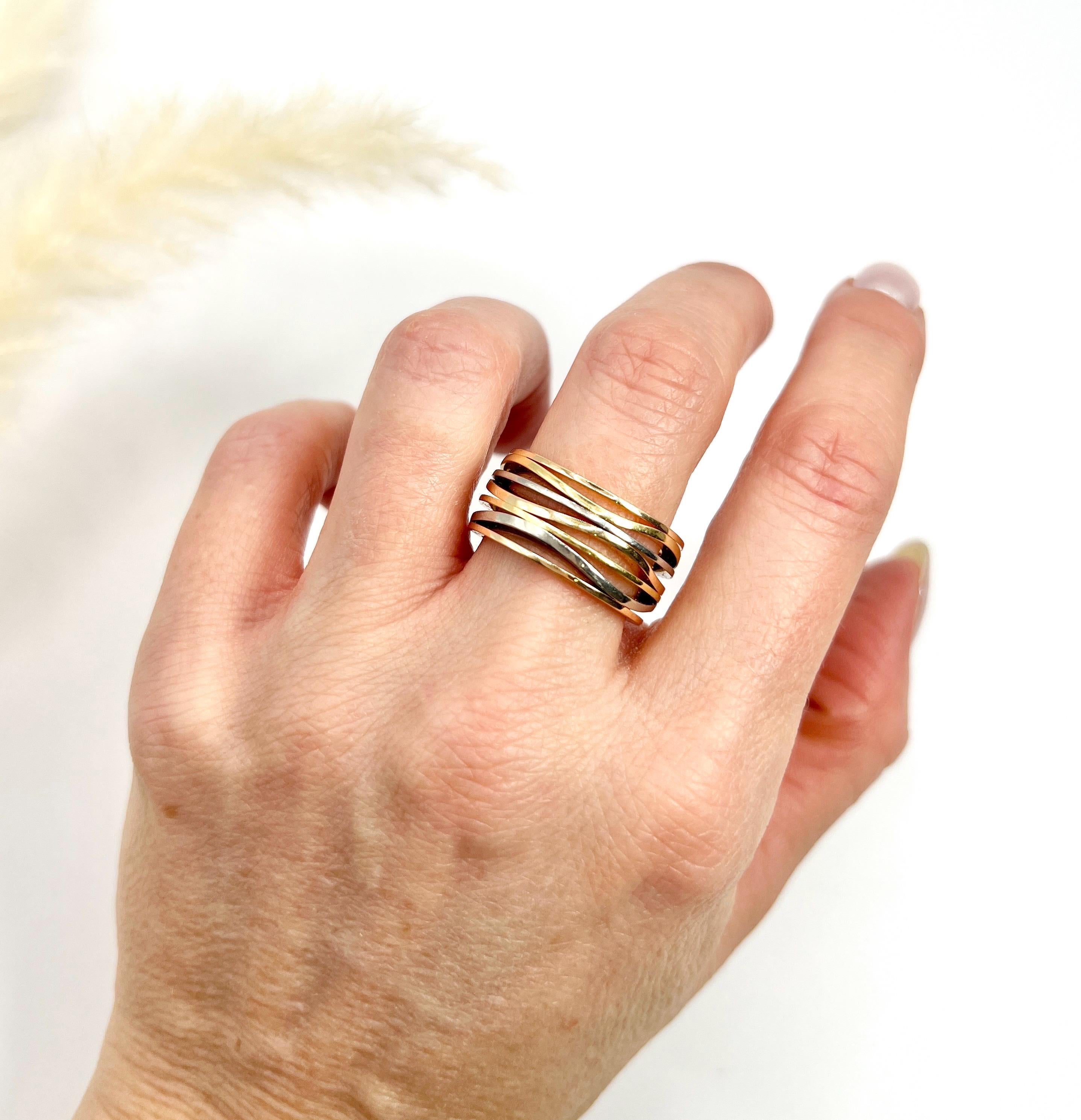 Vintage Three Colour Band

18ct Gold Hallmarked

Circa 2000

Introducing the stunning Three Colour 18ct Gold Omega Ladymatic Ring, a timeless piece that embodies sensuality and sophistication. Crafted with meticulous attention to detail, this ring