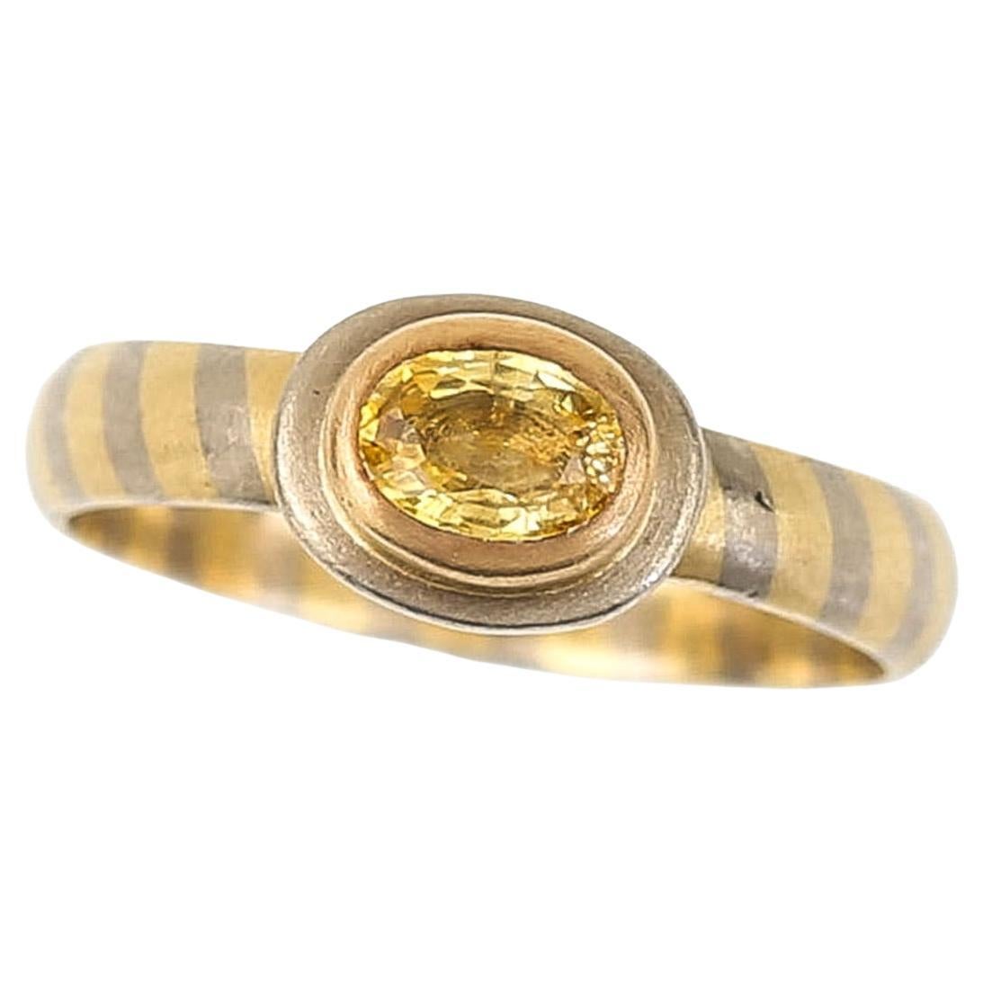 Vintage 18 Carat White and Yellow Gold Yellow Sapphire Ring, circa 1989 For Sale