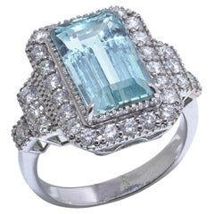 Anello vintage con acquamarina e diamanti a grappolo in oro bianco 18 ct.