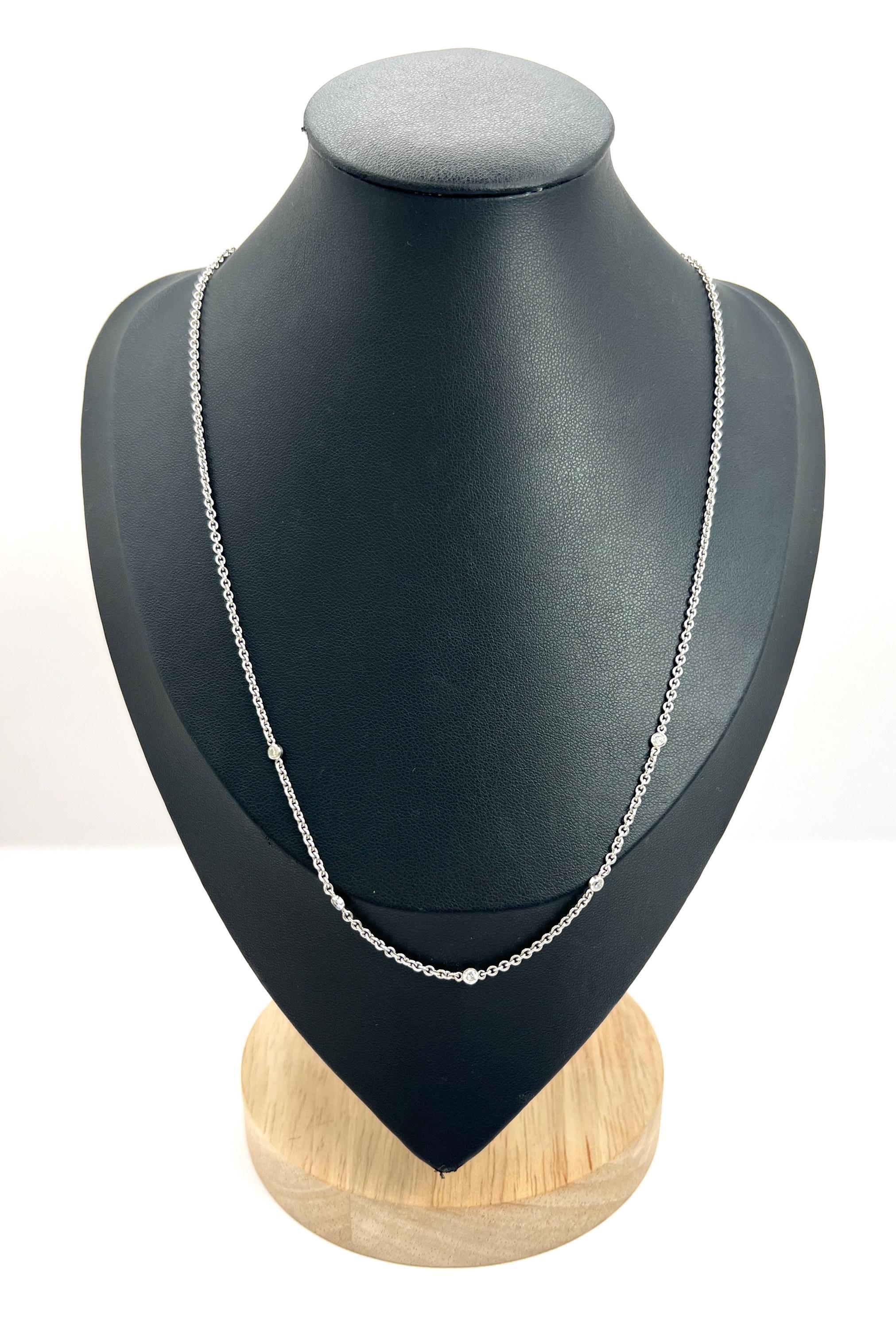 Diamond Set Chain 

18ct White Gold Stamped 750

Circa 2000

This exquisite vintage chain, crafted in 18ct white gold and dating back to circa 2000, showcases a delicate trace link design that effortlessly combines elegance with versatility.