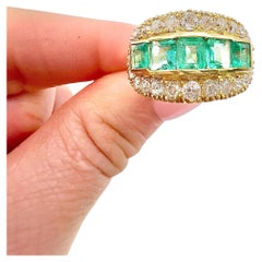 Anillo vintage de oro amarillo de 18 ct, esmeralda y diamantes de cinco piedras, años 40