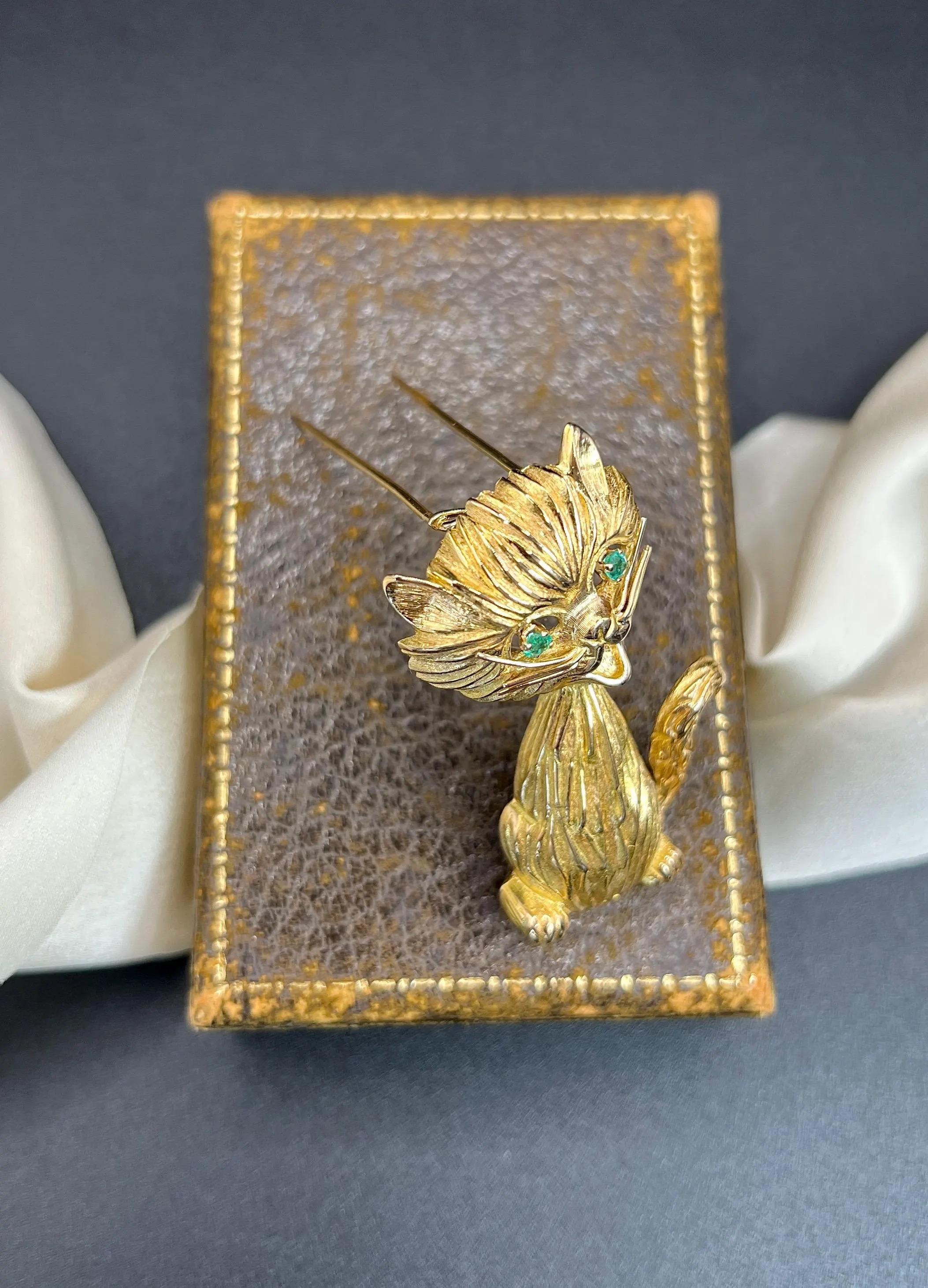 Vintage Cat Brooch

18ct Gold

Circa 1960s

Add a touch of whimsy to your jewellery collection with this fabulous-sized 18ct yellow gold cat brooch. Playfully posed, this adorable kitty showcases beautifully textured fur that captures the light in a