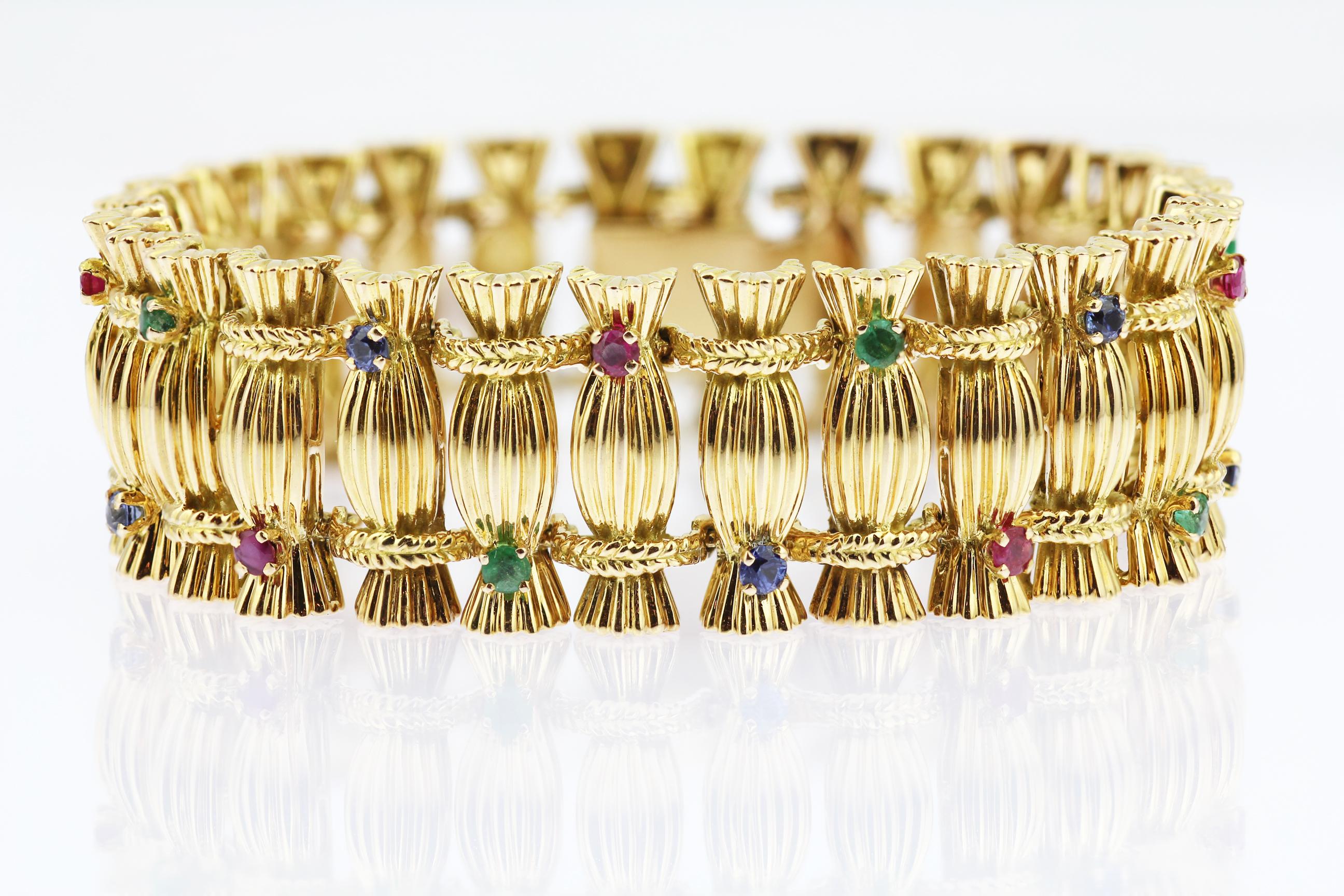 Modernist Vintage 18ct yellow gold 1970s French sapphire, ruby & emerald set bracelet For Sale