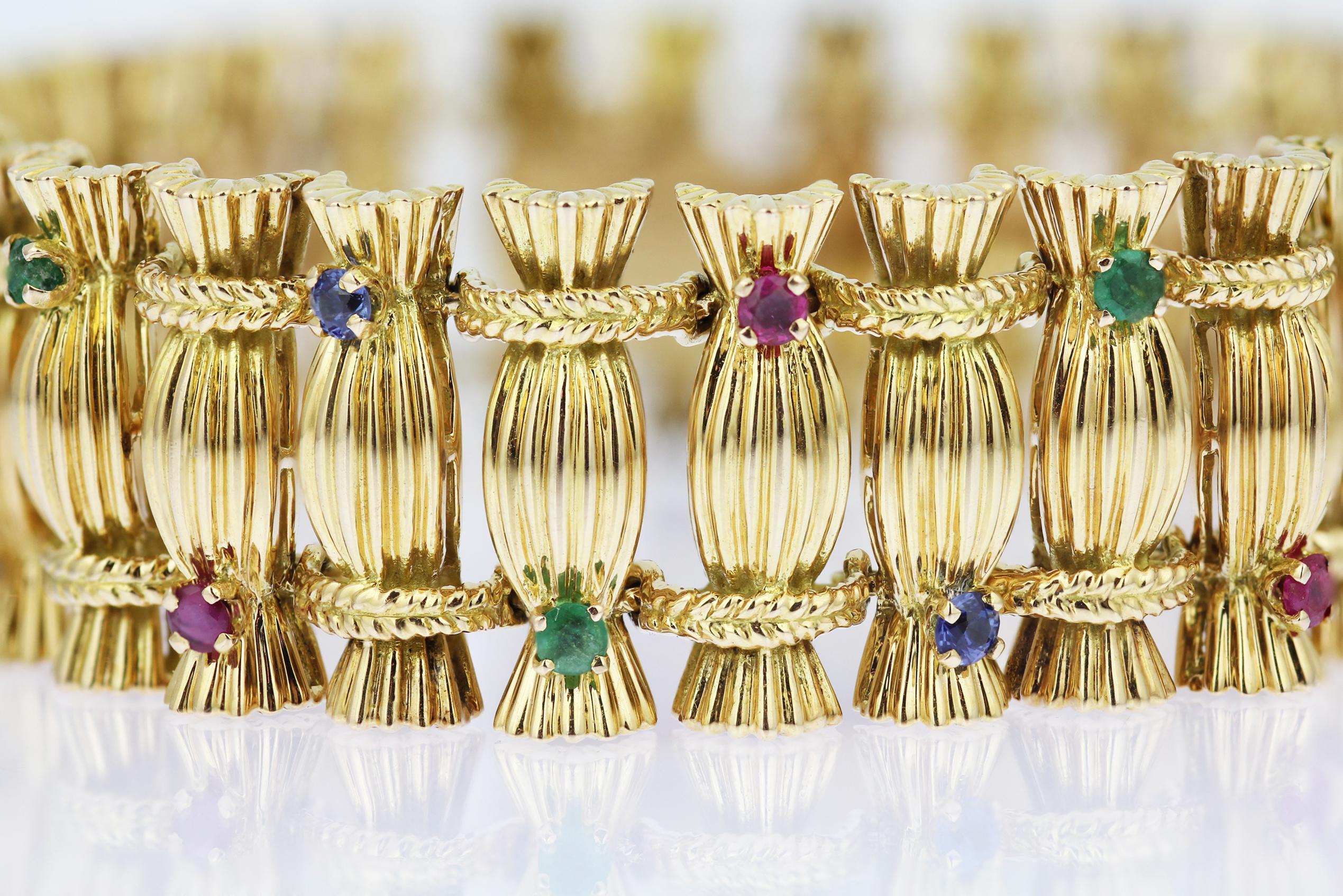 Round Cut Vintage 18ct yellow gold 1970s French sapphire, ruby & emerald set bracelet For Sale