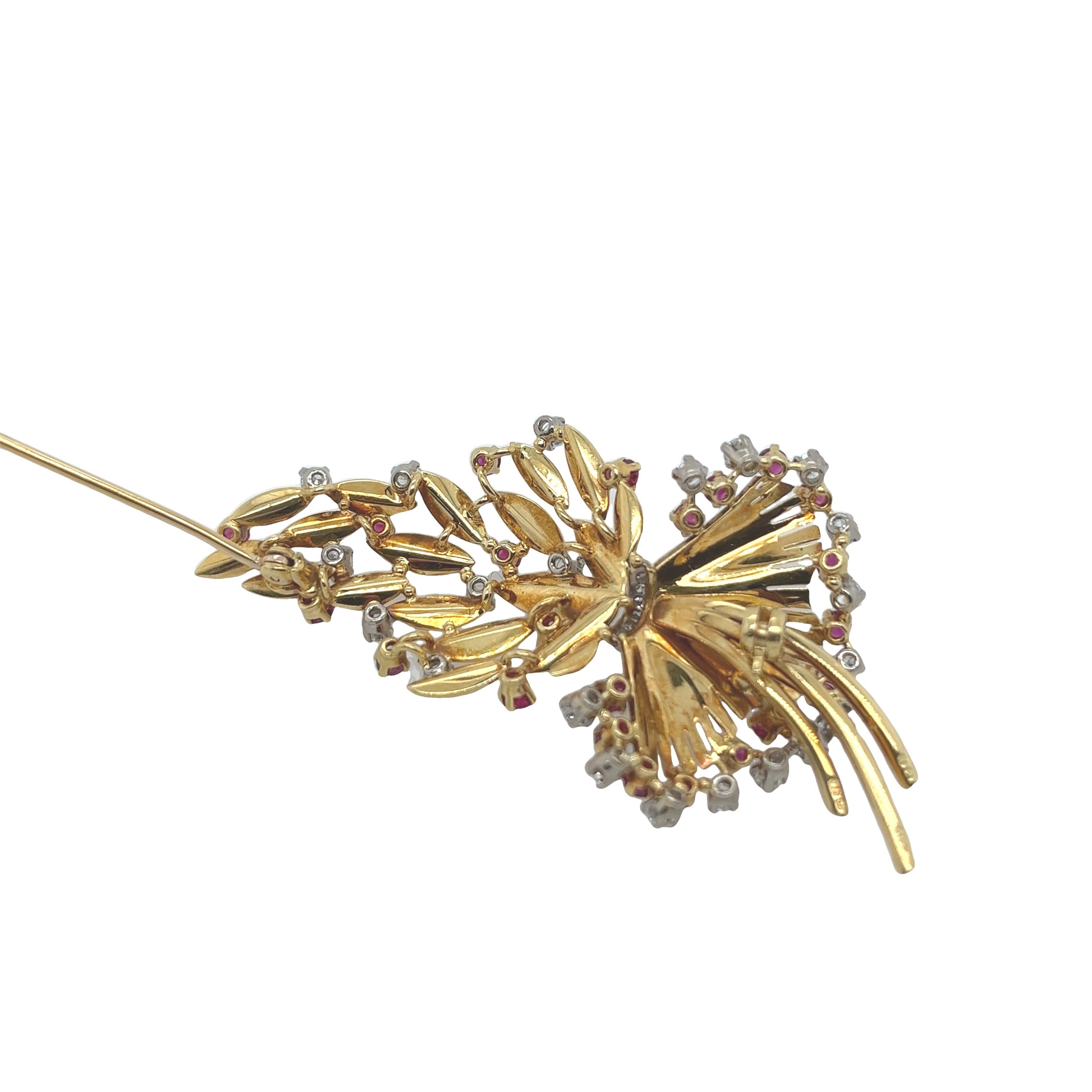 
This stunning vintage brooch is set with 28 round brilliant cut diamonds and 23 round rubies, set in 18ct yellow gold setting with pin and roll catch. 
This is a perfect gift for any occasion.

Total Gold Weight: 14.6g
Total Diamond Weight: