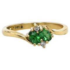 Ring aus 18 Karat Gelbgold mit Diamant und Tsavorit
