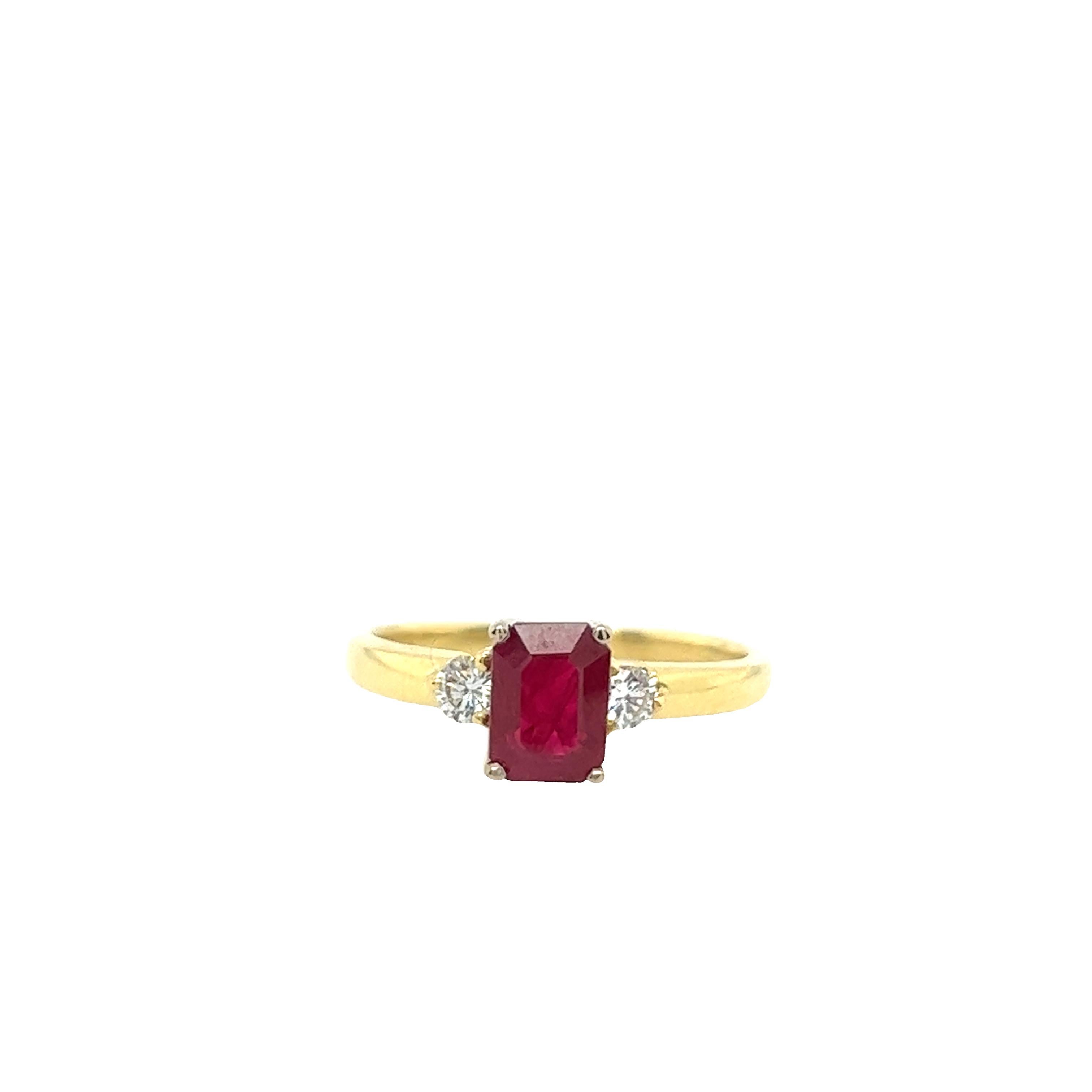 An elegant and unique vintage ruby and diamond ring, set with 2 round brilliant cut natural diamonds 0.20ct, in an 18ct yellow gold beautiful setting.

Width of Band: 1.89mm
Width of Head: 7.08mm
Length of Head: 9.33mm
Total Weight: 3.1g
Ring Size: