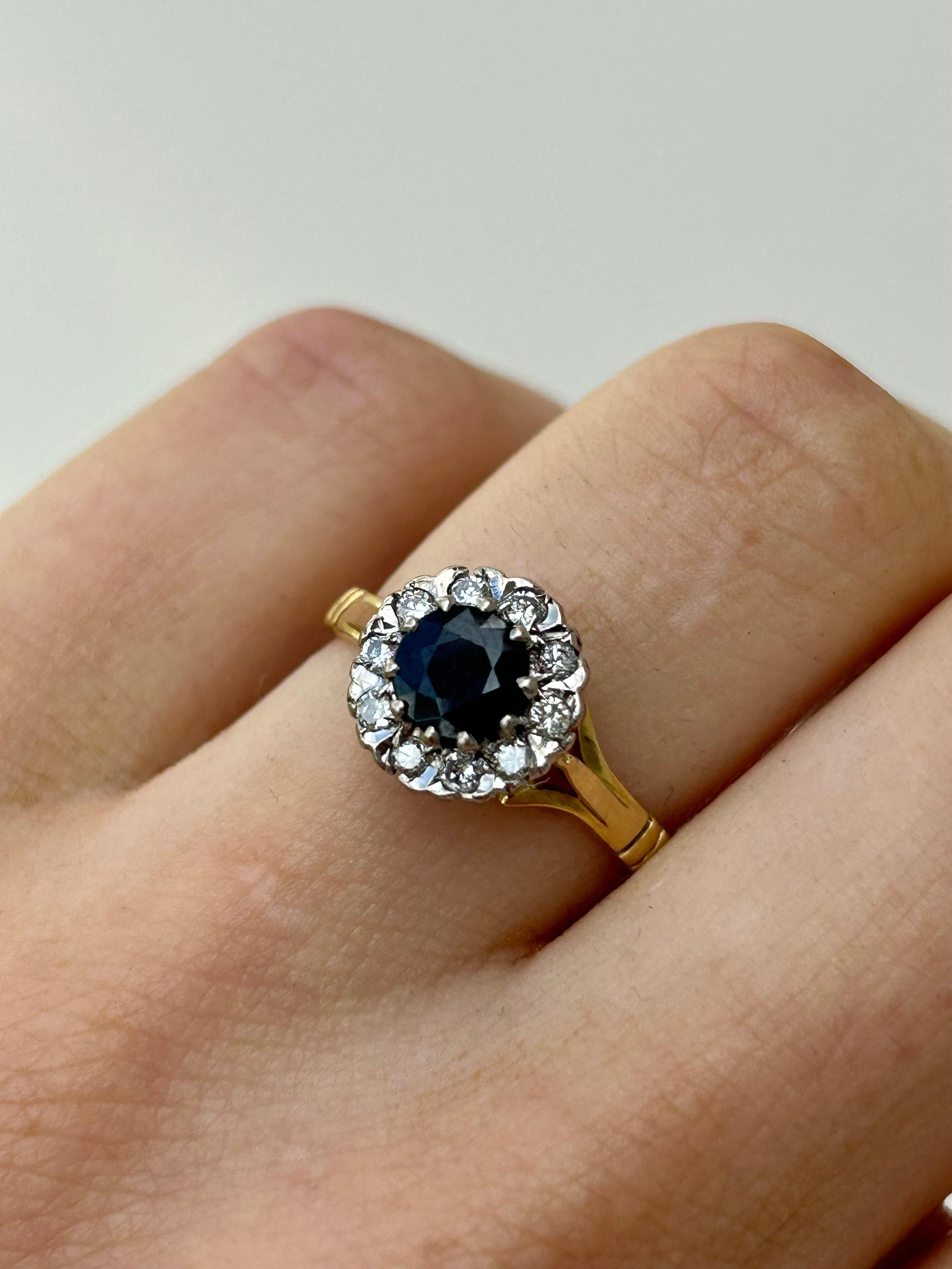 Vintage 18ct Yellow Gold Sapphire and Diamond Ring 

gorgeous sapphire stone with diamonds surrounding, truly excellent! 

The item comes without the box in the photos but will be presented in an Howard’s Antique gift box
 
Measurements: weight