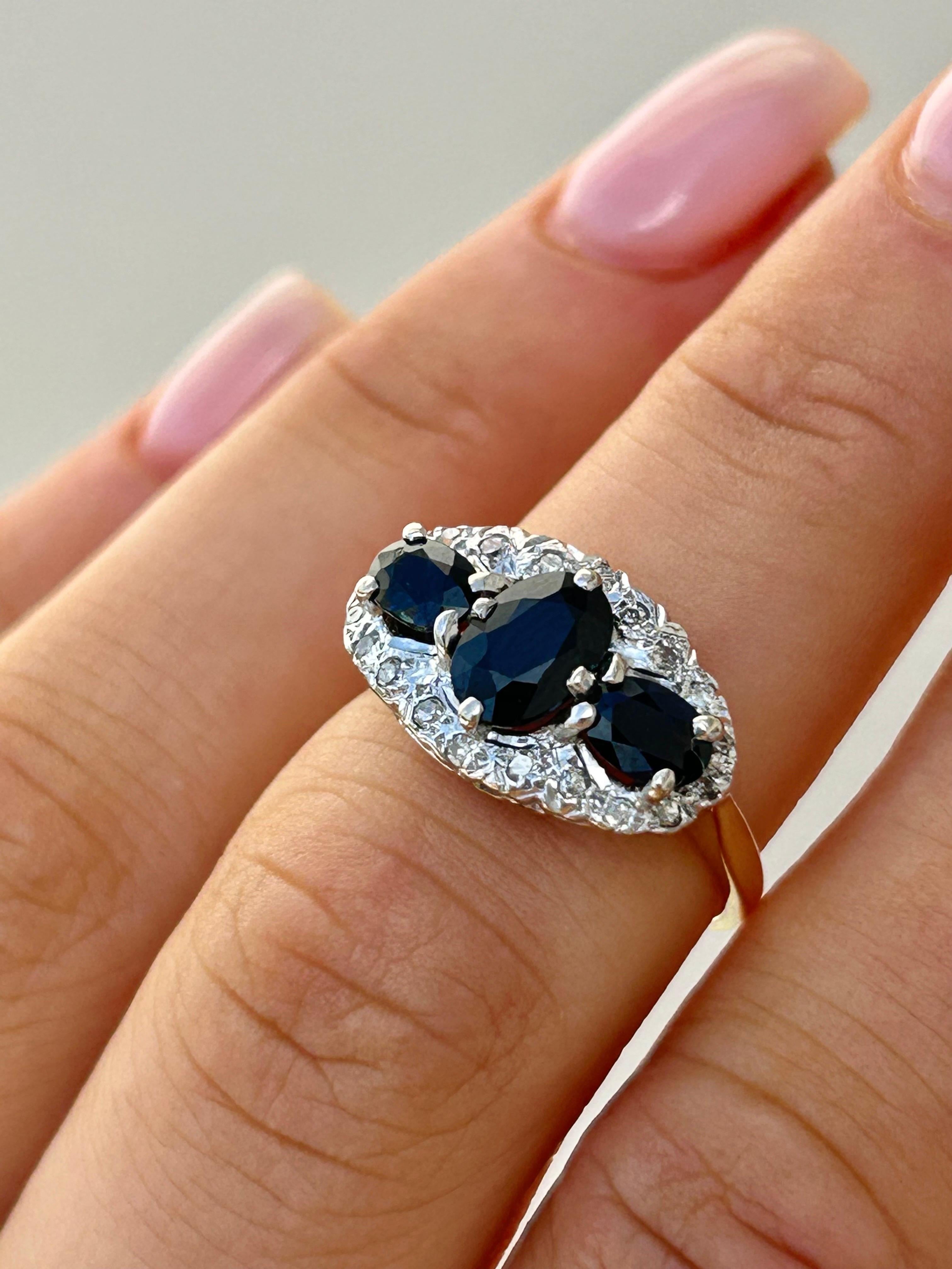 Vintage 18ct Yellow Gold Sapphire and Diamond Triple Halo Ring 

3 exquisite sapphire stone with diamonds surrounding, truly excellent 

The item comes without the box in the photos but will be presented in a gembank1973 gift box
 
Measurements: